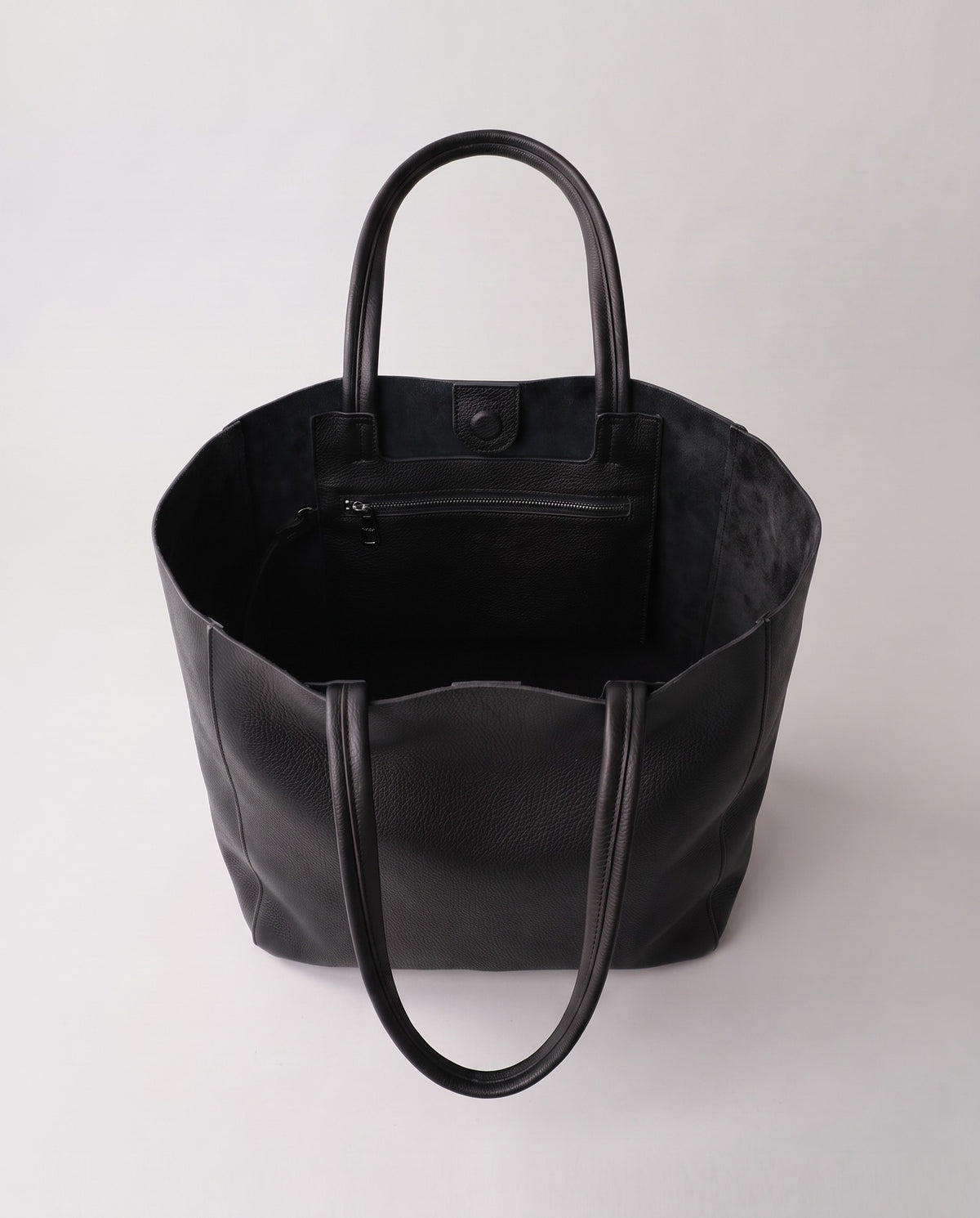 Costa leather tote in black, open showing interior