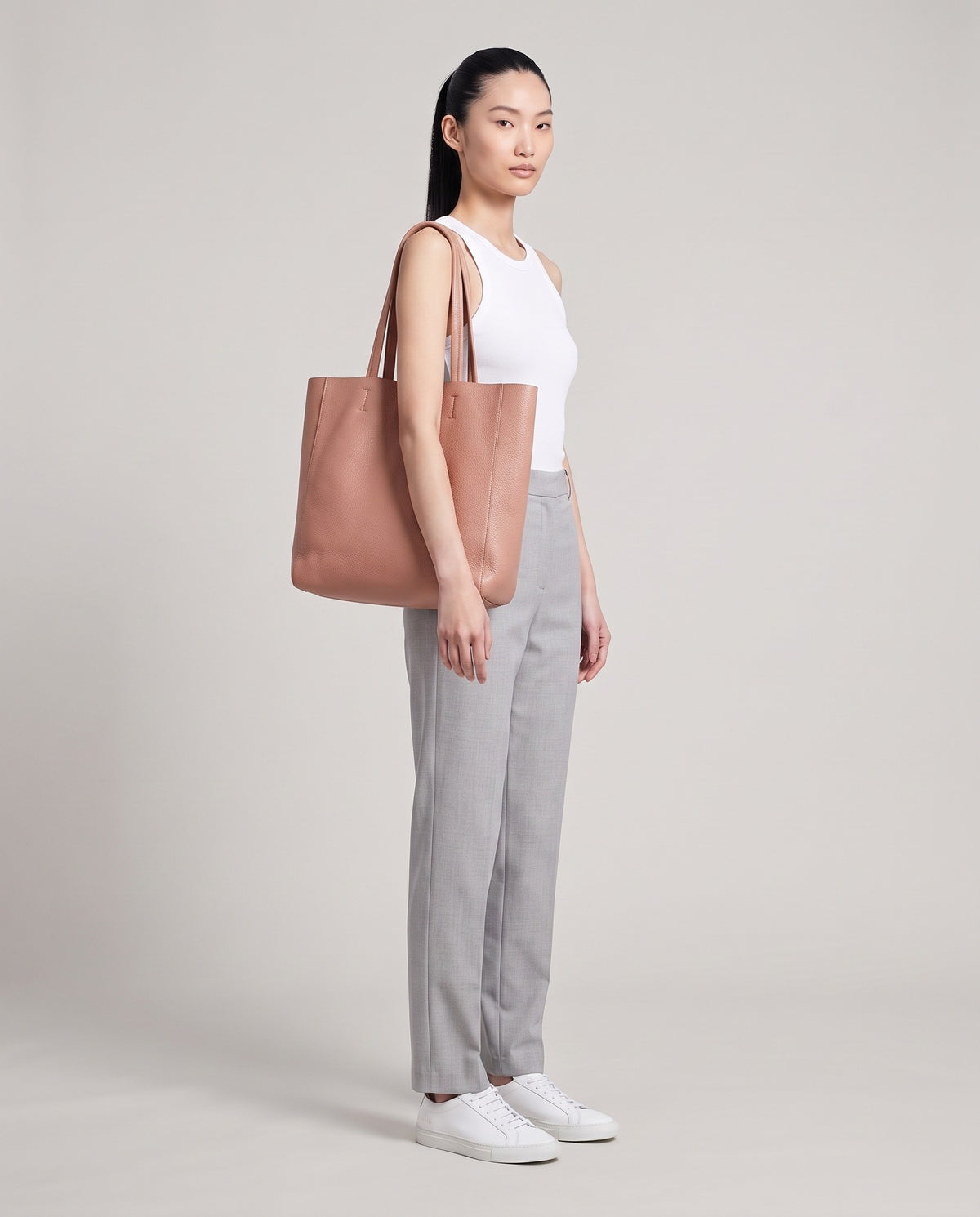 Model with the Costa leather tote in blush, full length