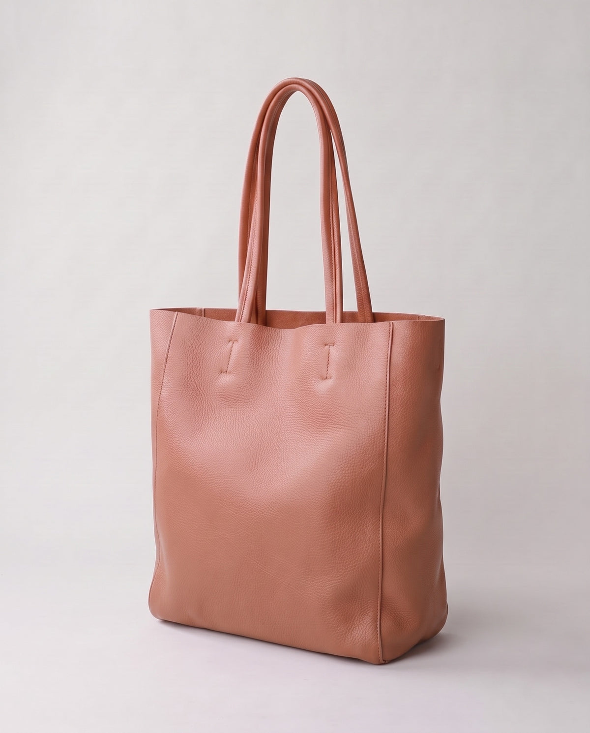 Costa leather tote in blush, three-quarter view