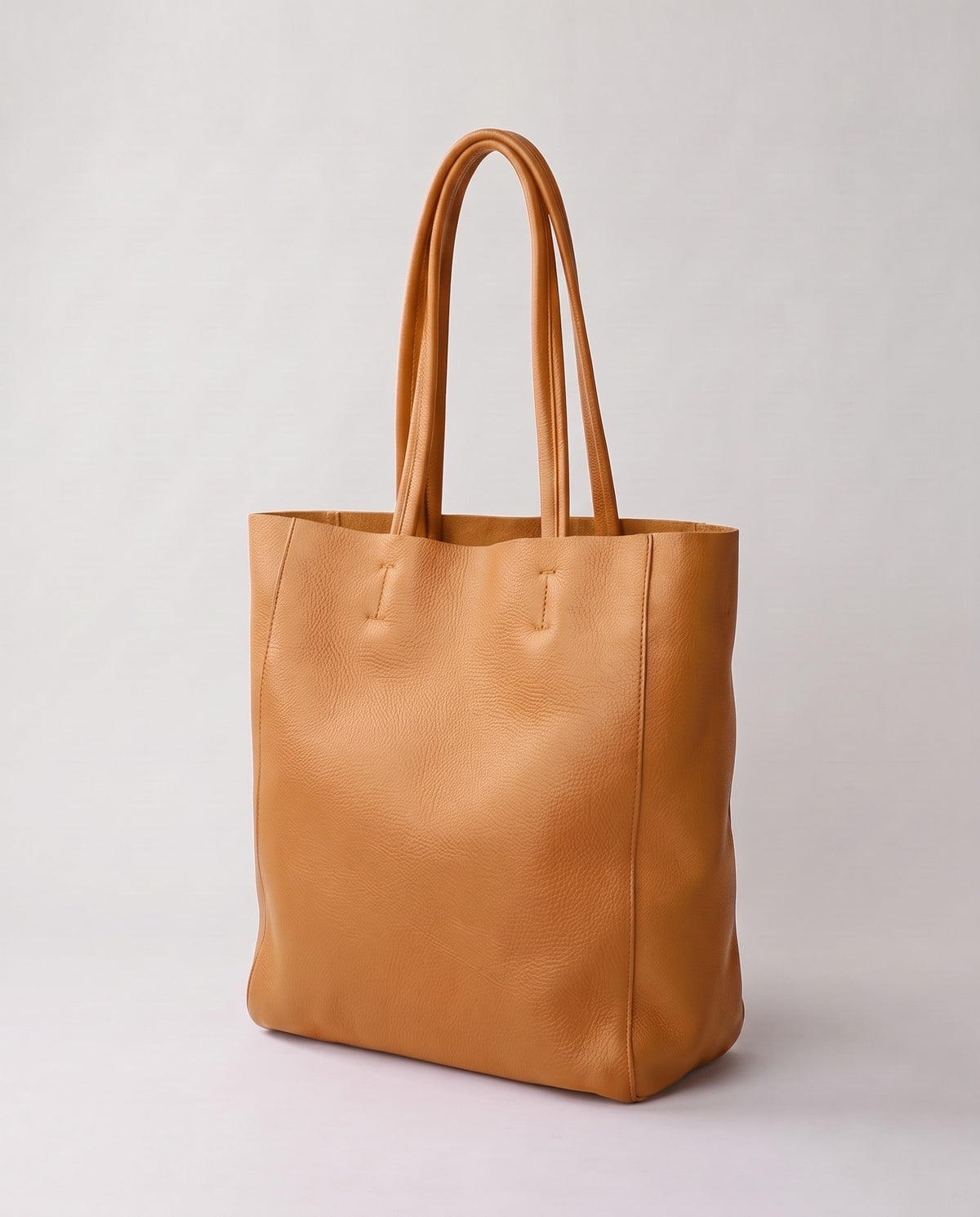 Costa leather tote in camel, three-quarter view