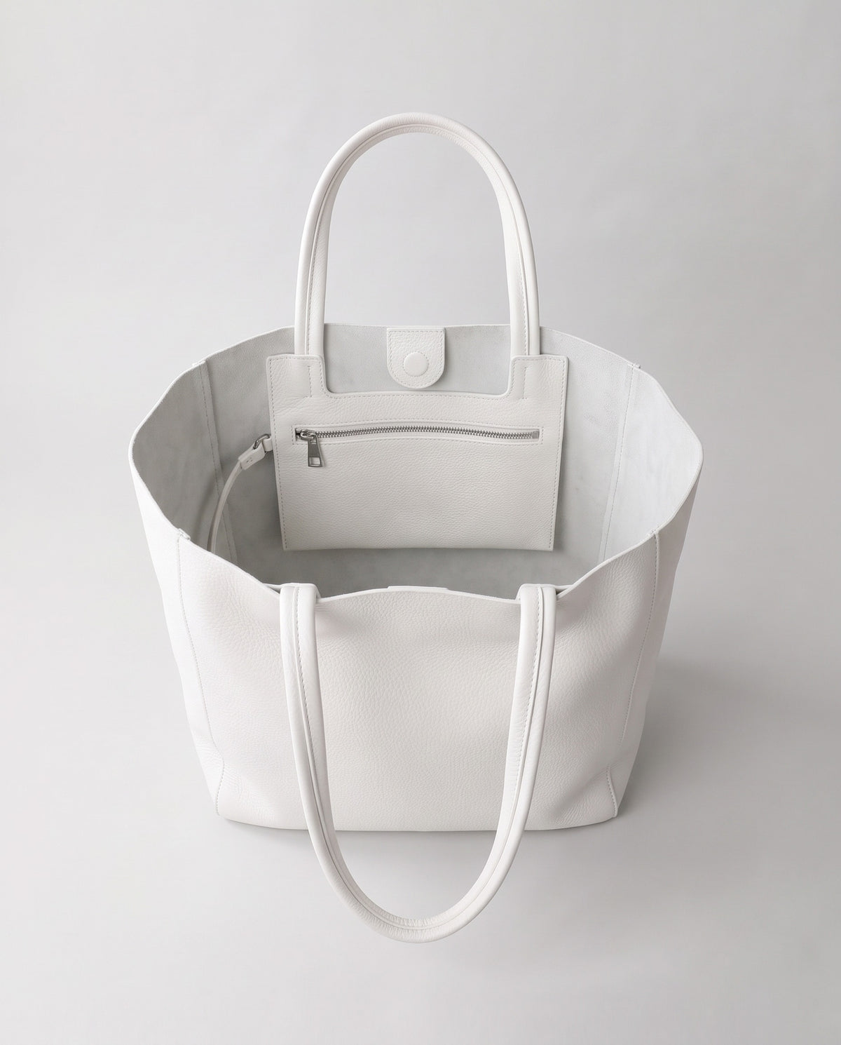 Costa leather tote in chalk, open showing interior
