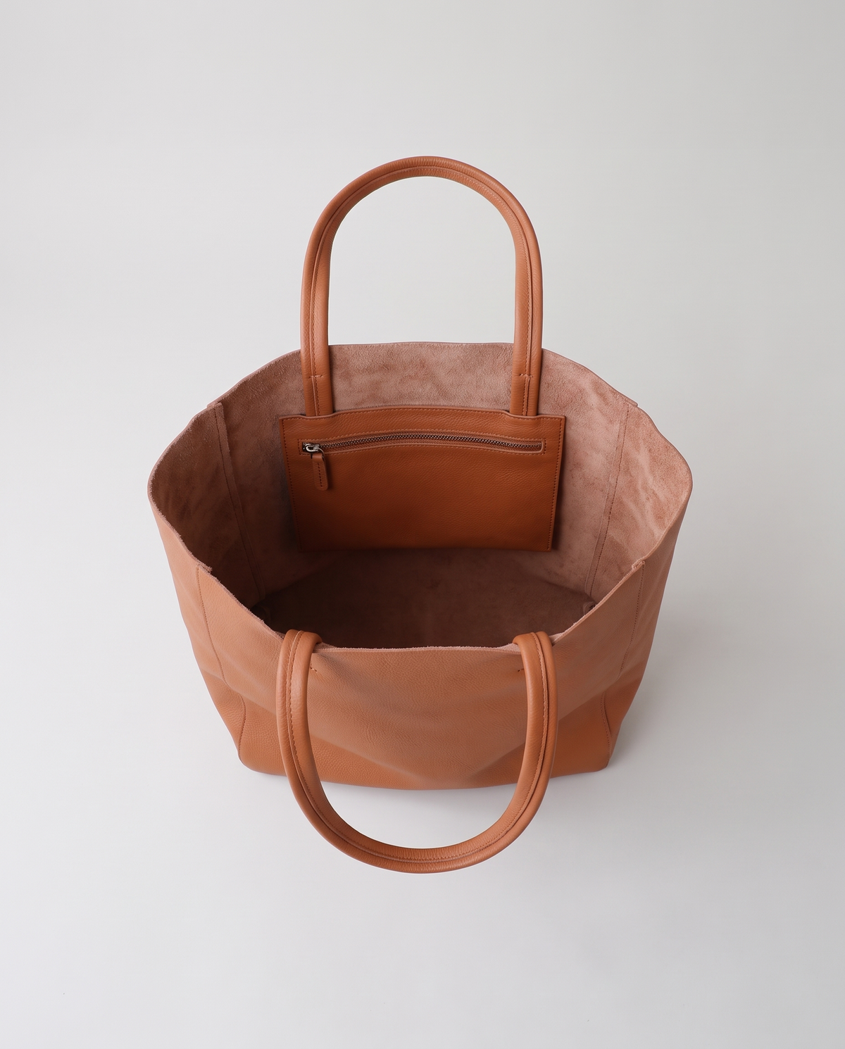 Costa leather tote in cognac, open showing interior
