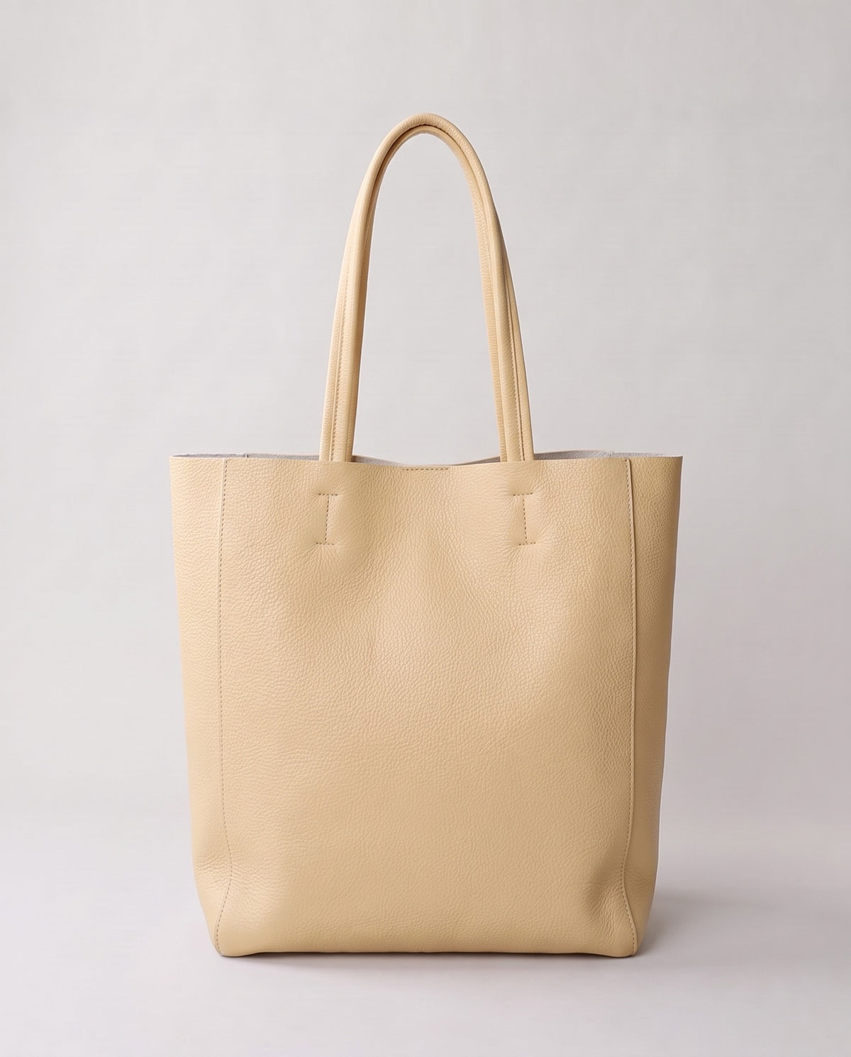 Costa leather tote in cream, back view