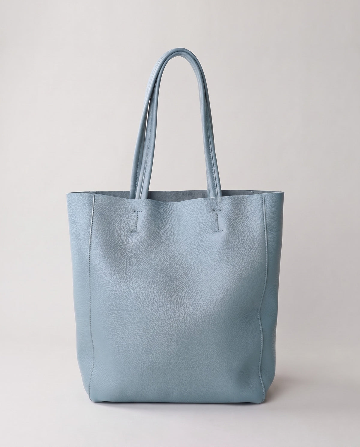 Costa leather tote in sky, front view
