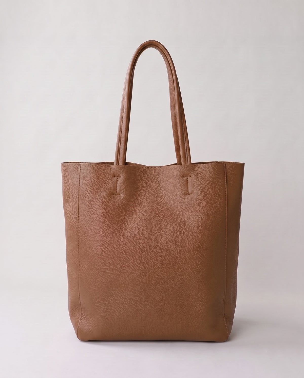 Costa leather tote in taupe, back view