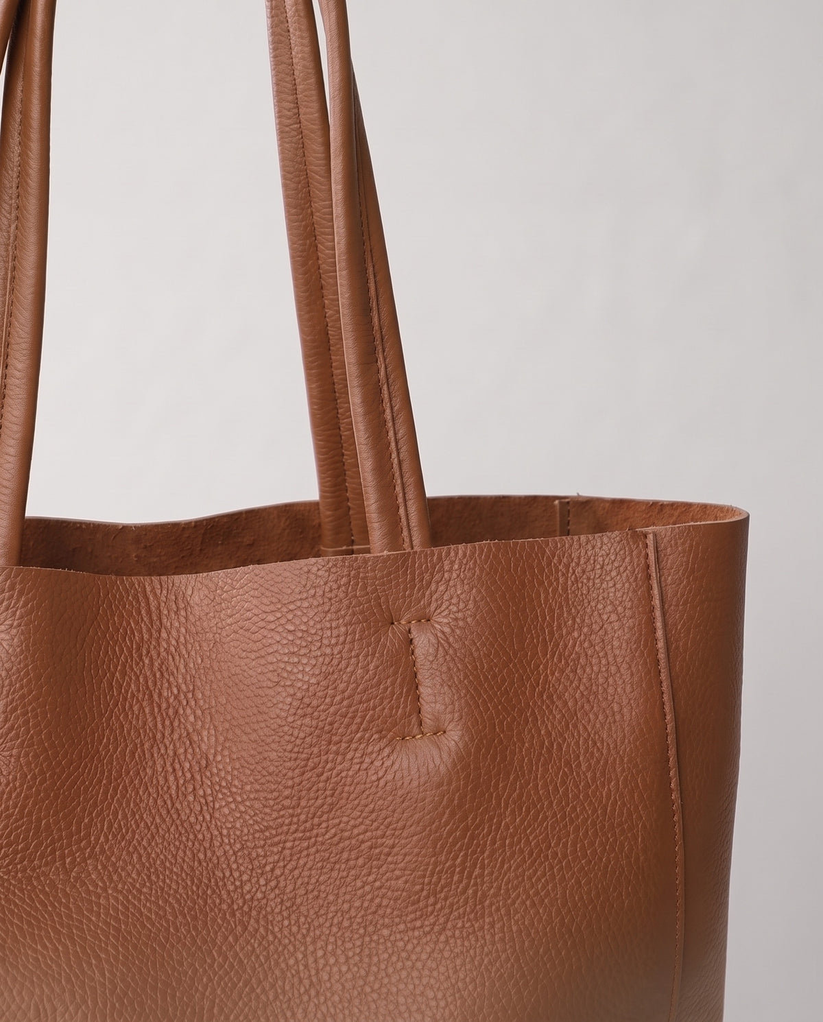 Costa leather tote in taupe, hardware and leather detail