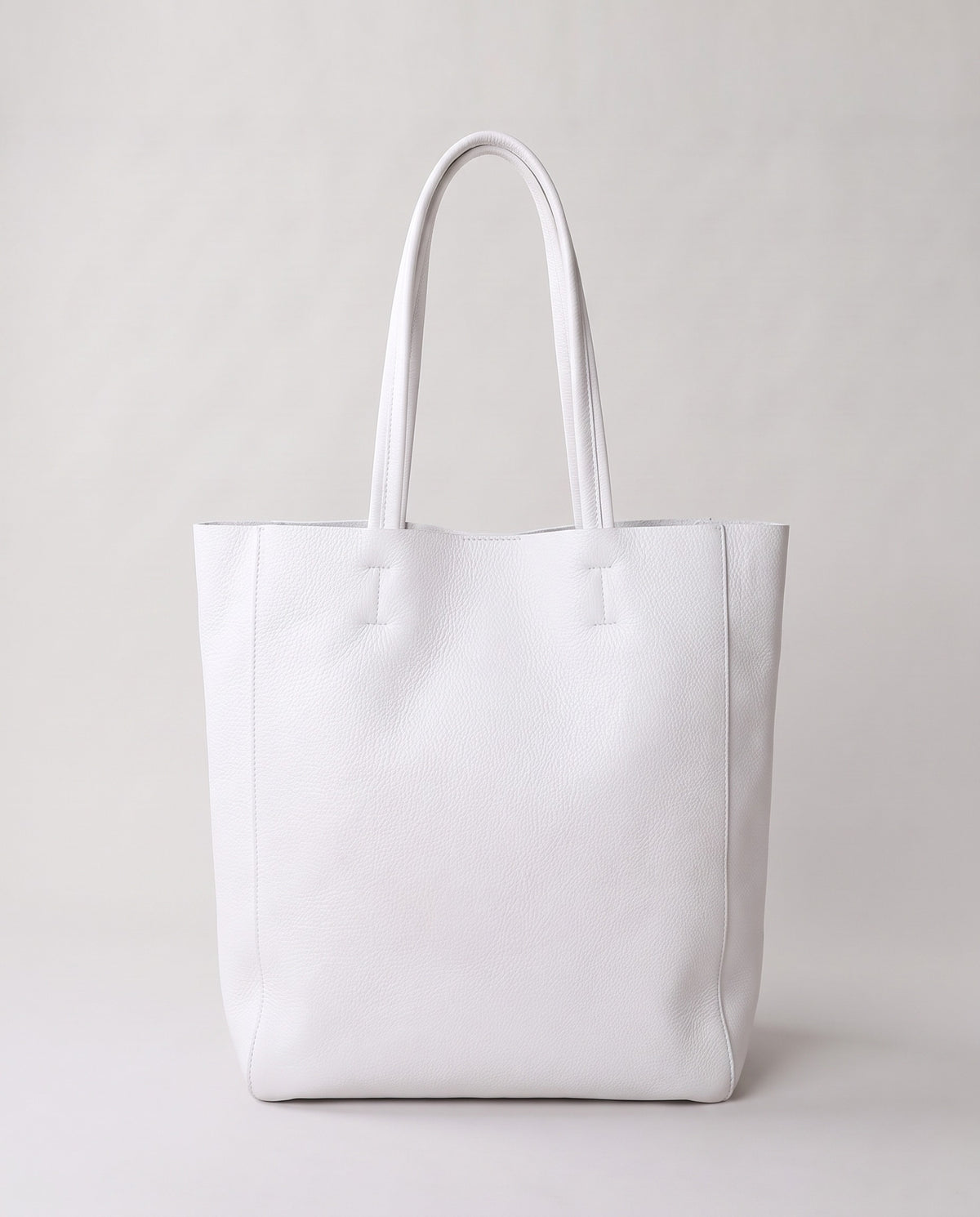 Costa leather tote in white, back view