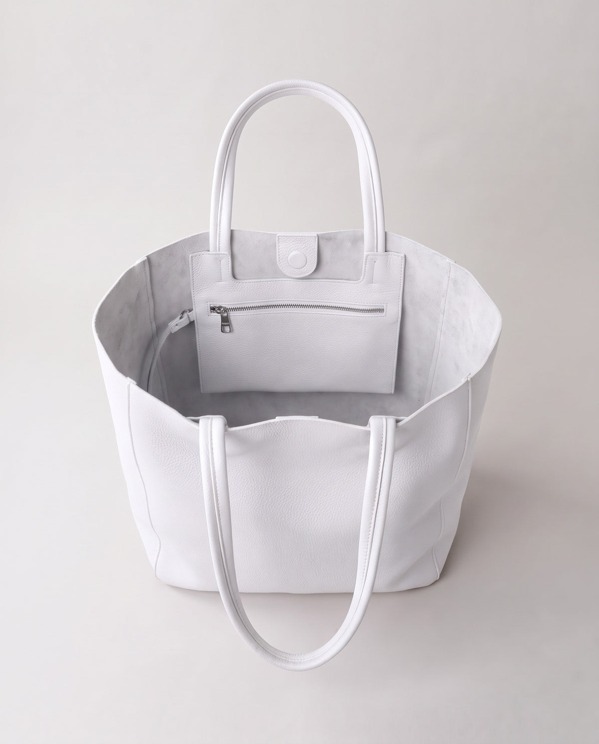Costa leather tote in white, open showing interior