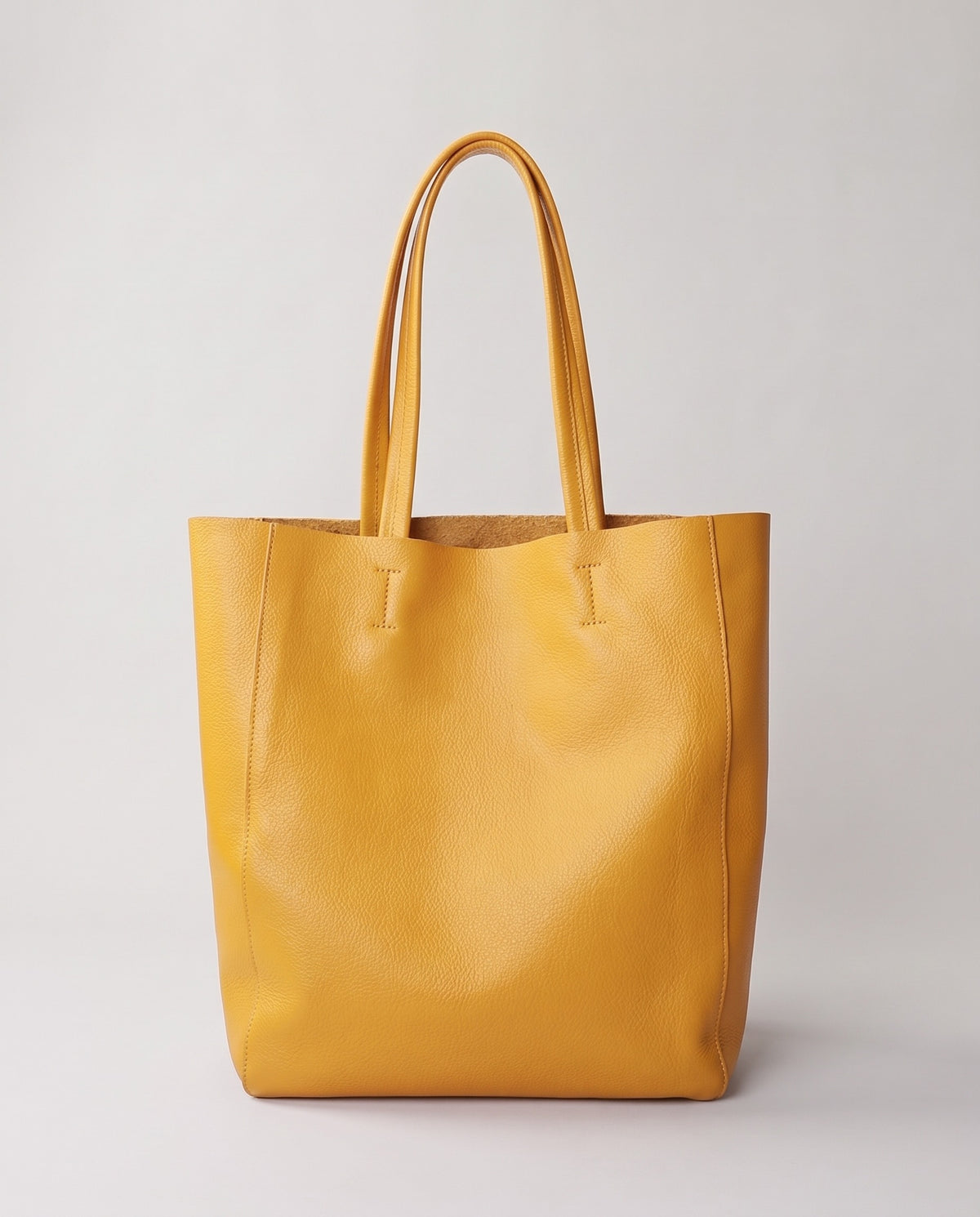 Costa leather tote in yellow, front view