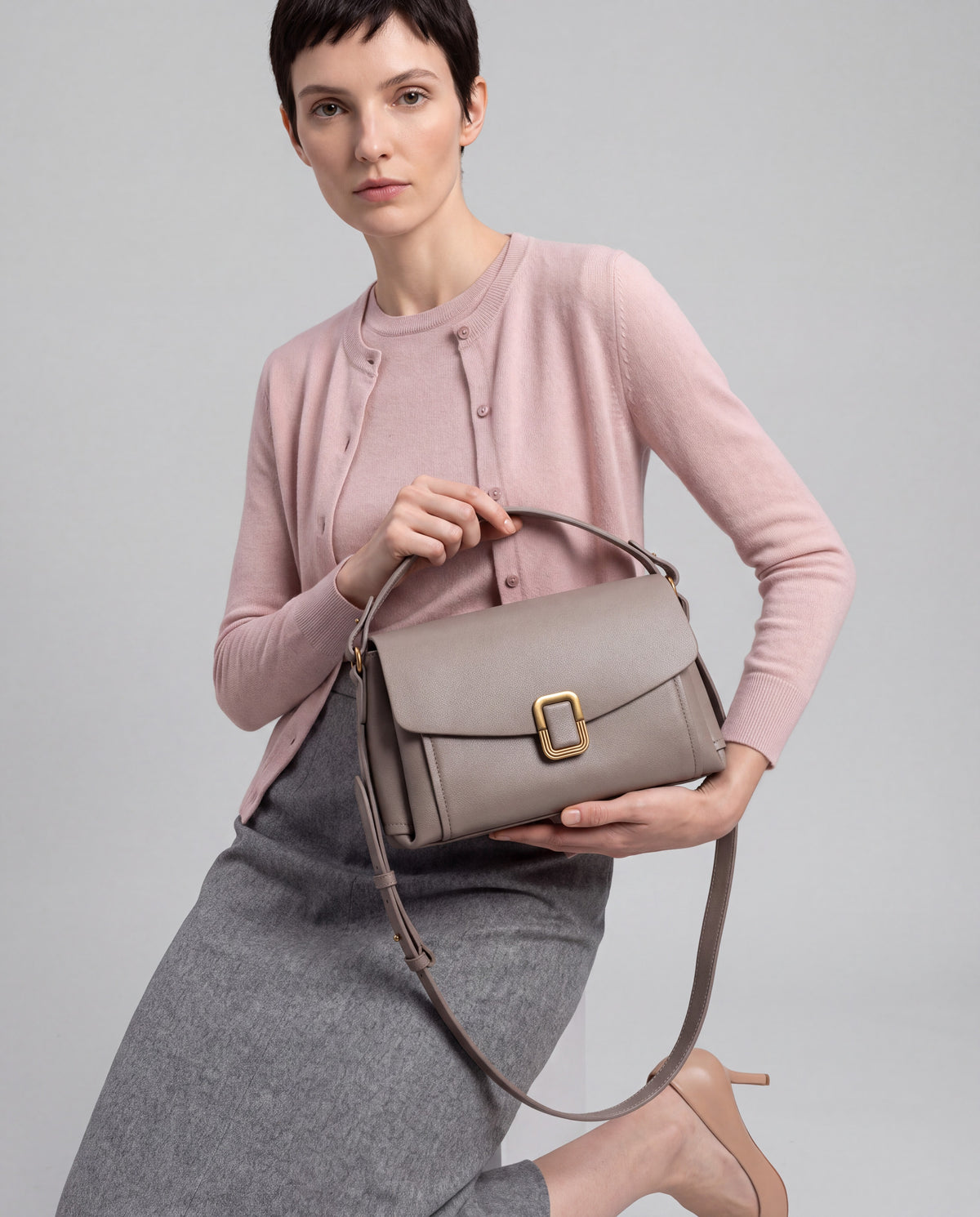 Creta bag in Stone – worn by model, close-up