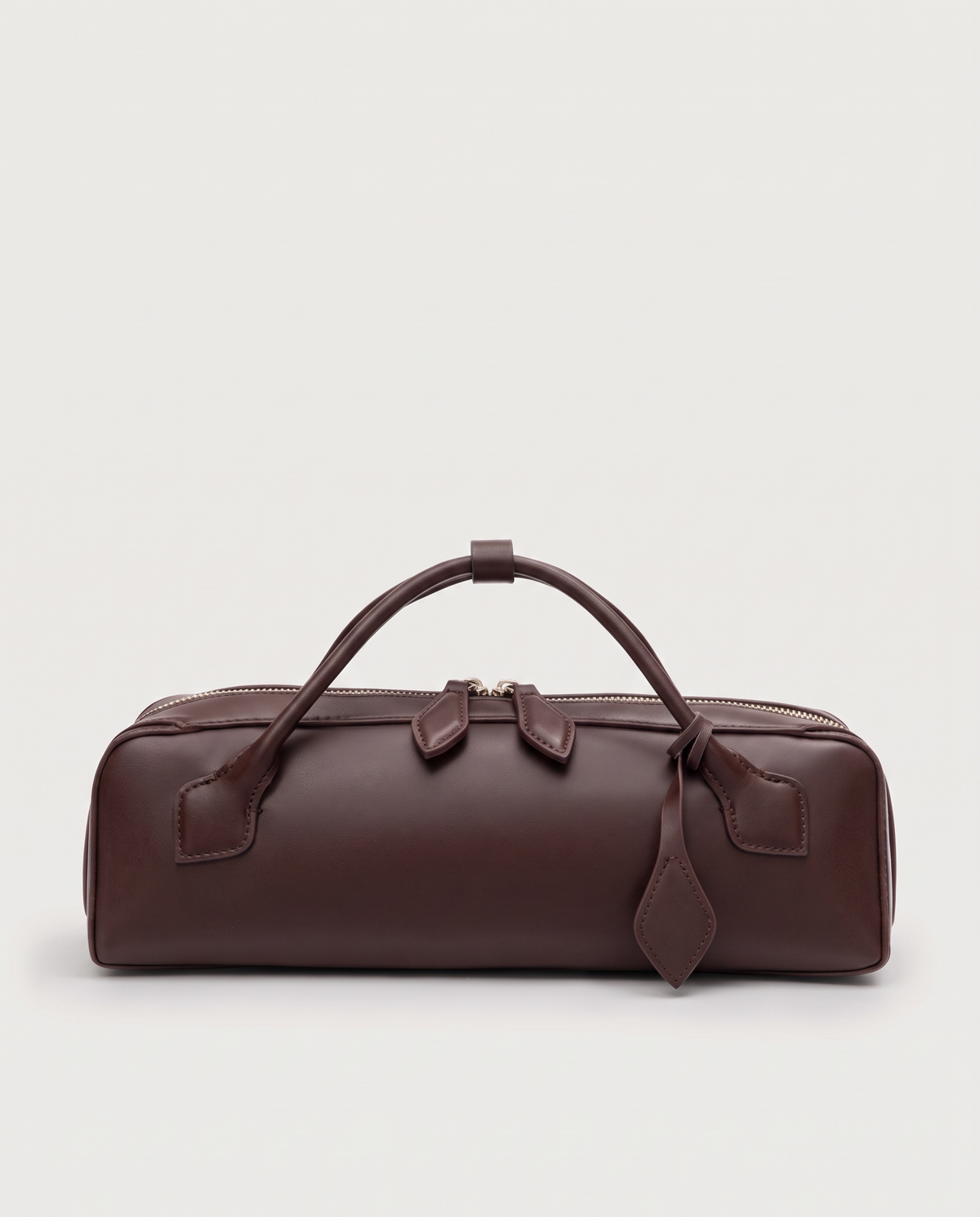 Curve leather barrel bag in Brown – front view