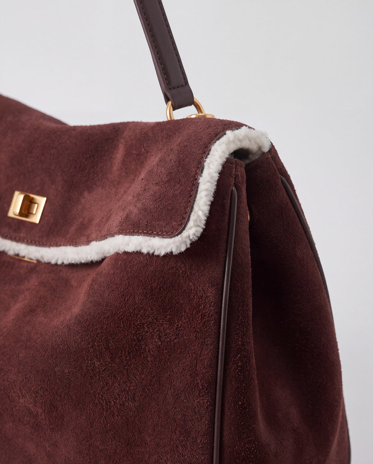 Dolce Small bag in Mahogany – leather detail