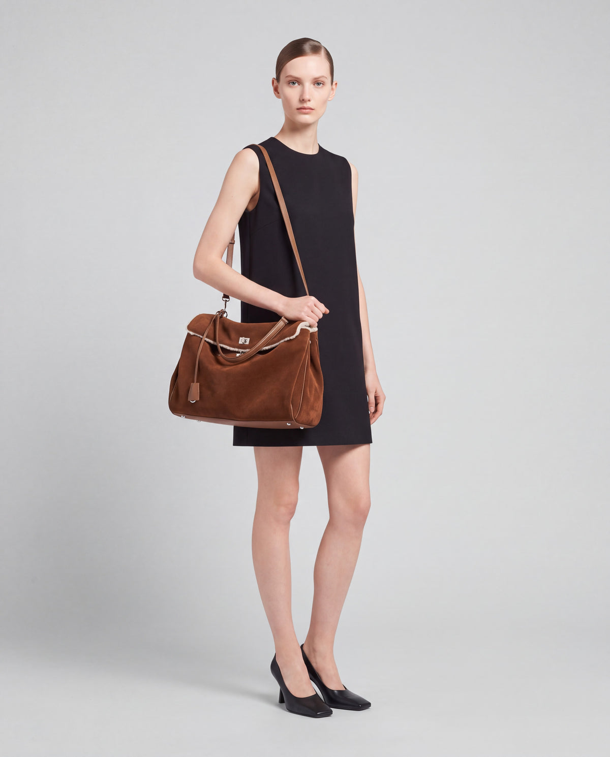 Dolce Medium bag in Brown – worn by model, full length