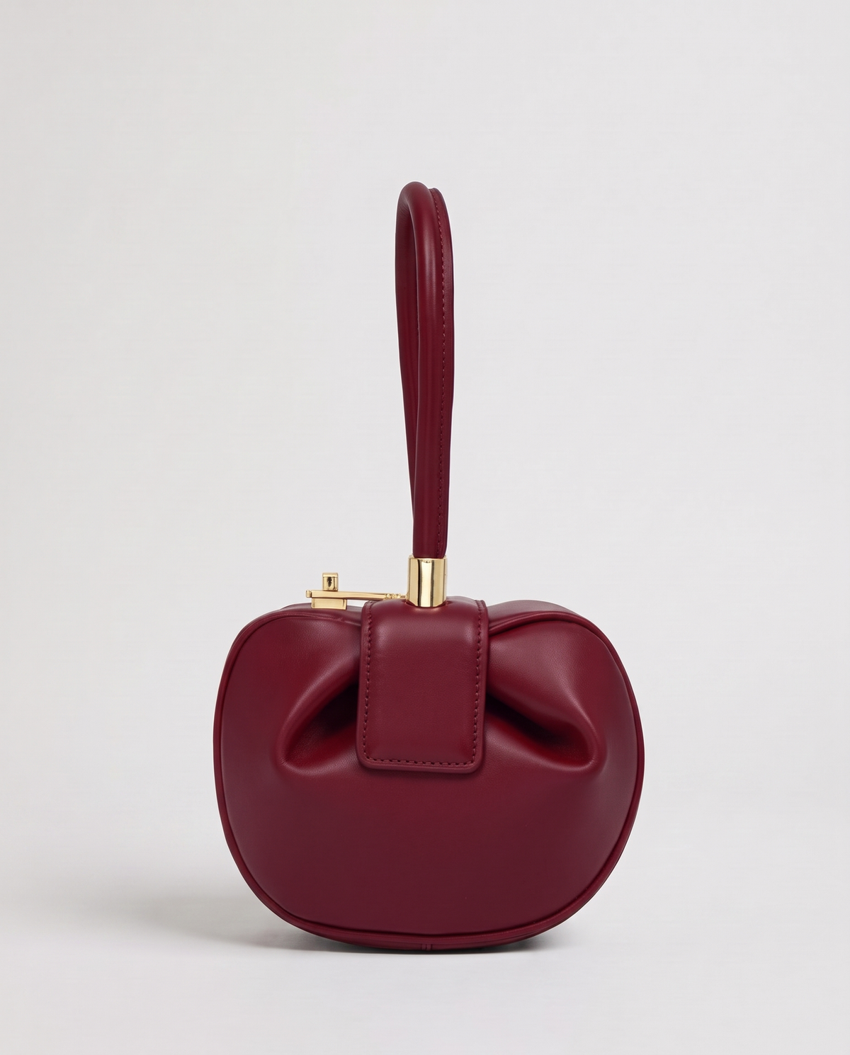 Dumpling Mini leather top-handle bag in Red – front view