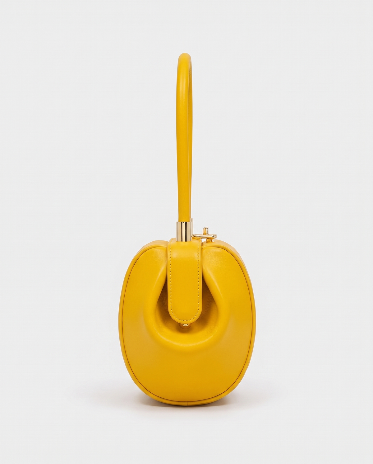 Dumpling Mini leather top-handle bag in Yellow – side view