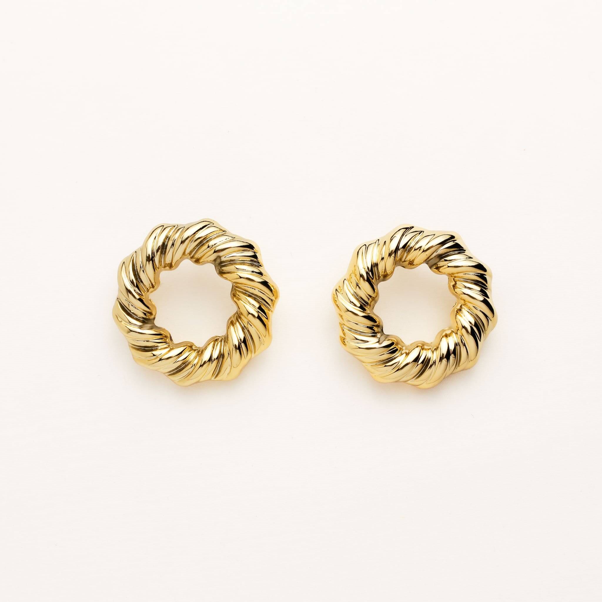 A pair of gold hoop earrings