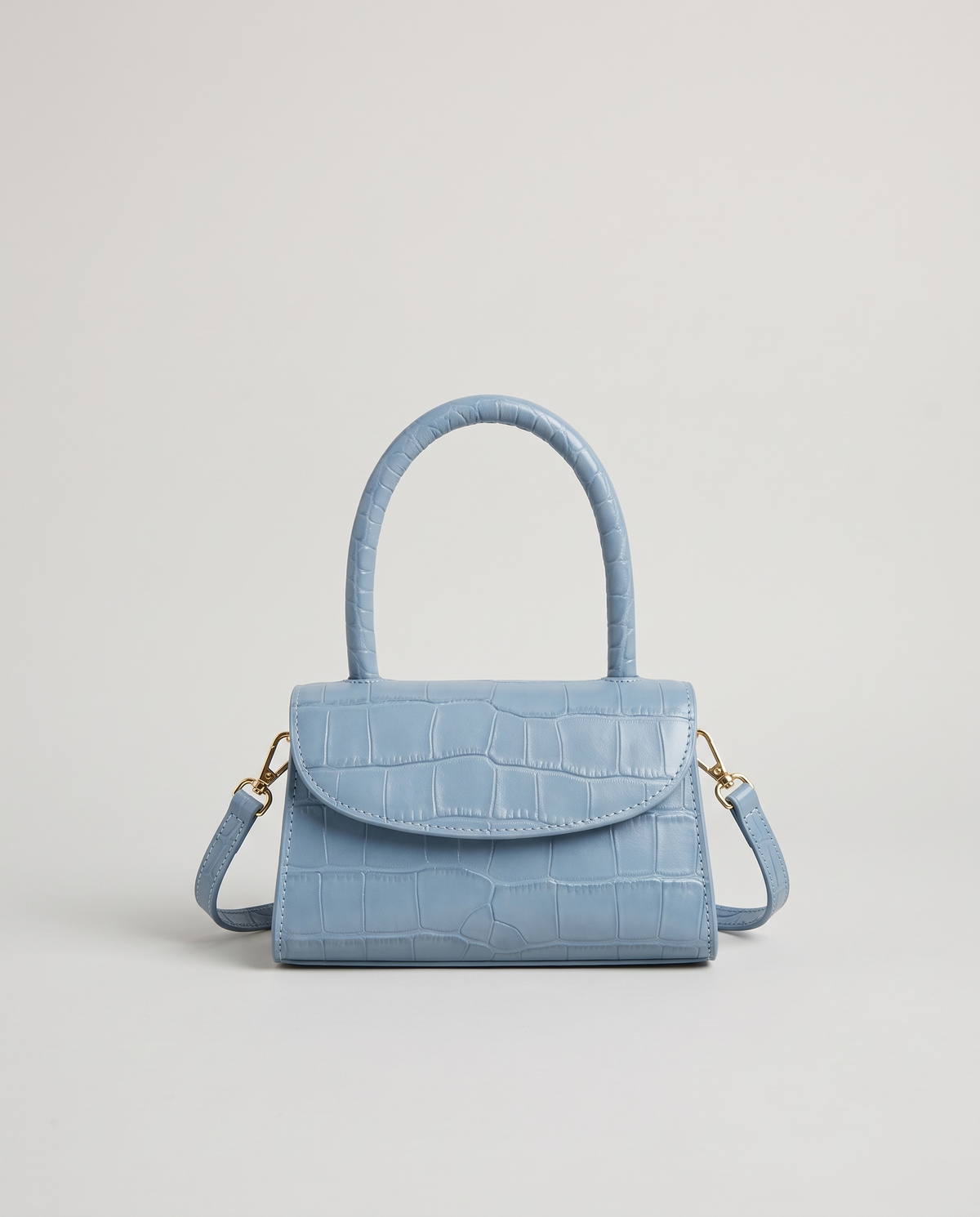 Fern mini croc top-handle bag in Blue – front view