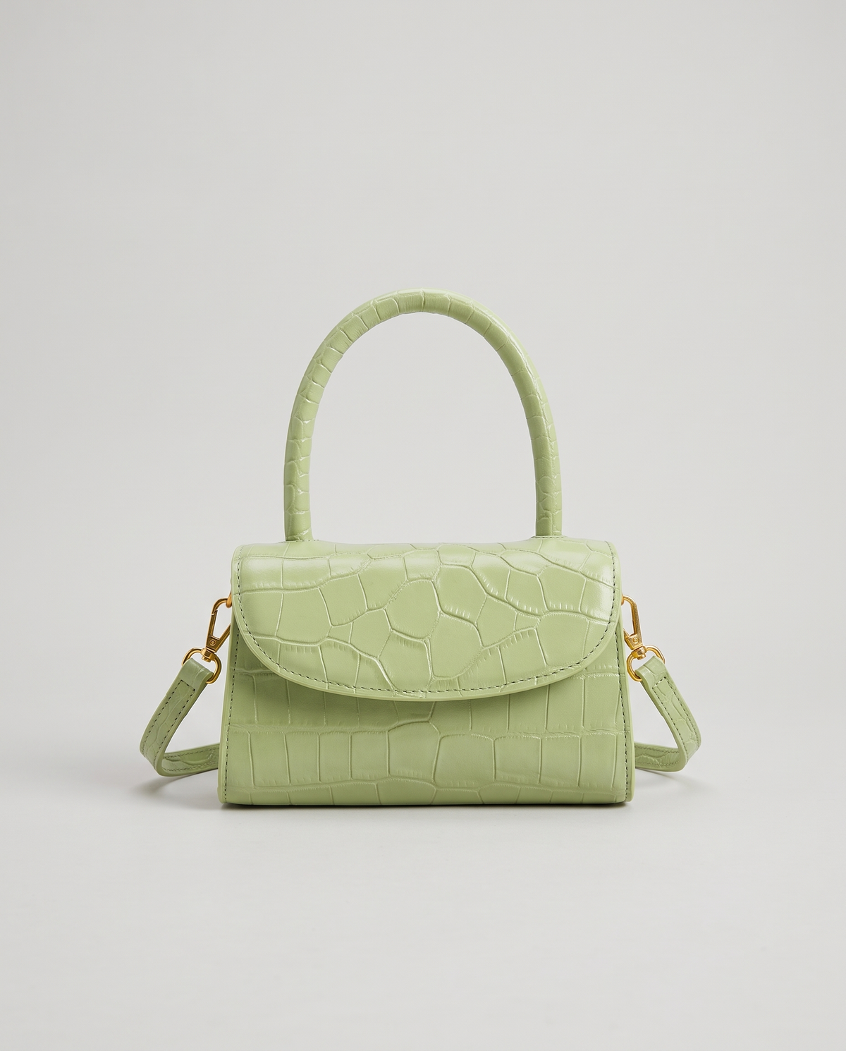Fern mini croc top-handle bag in Pistachio – front view