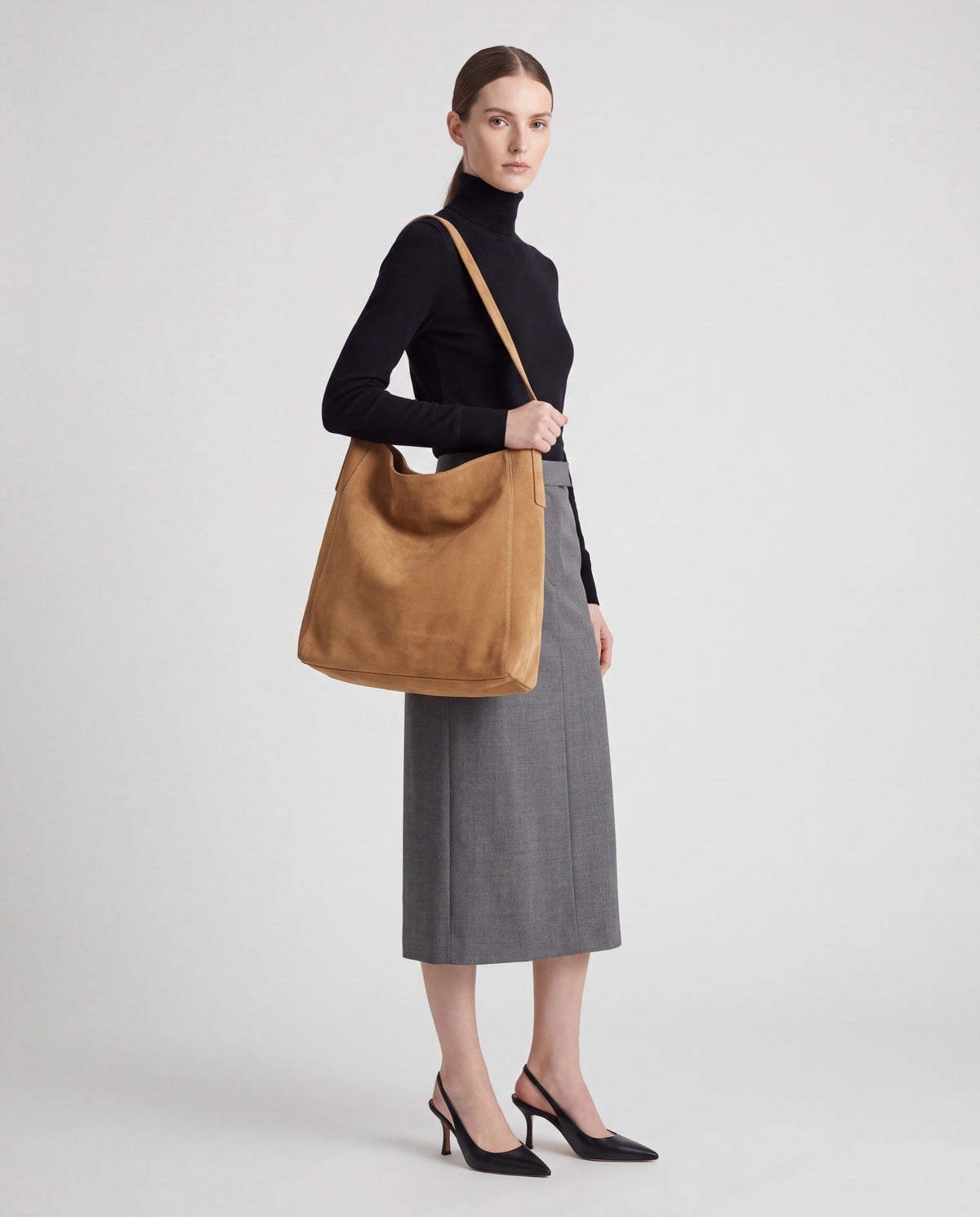 Fiato bag in Camel – worn by model, full length