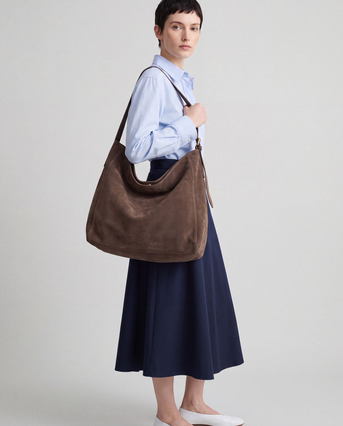Fiato bag in Grey – worn by model, close-up