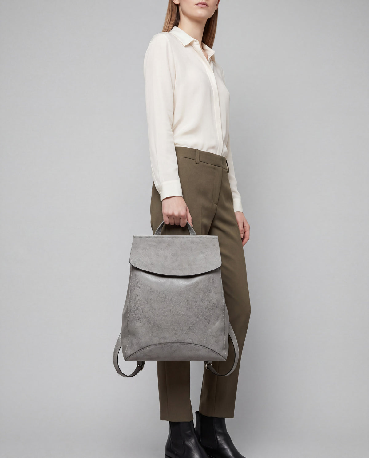 Forma bag in Grey – worn by model, close-up