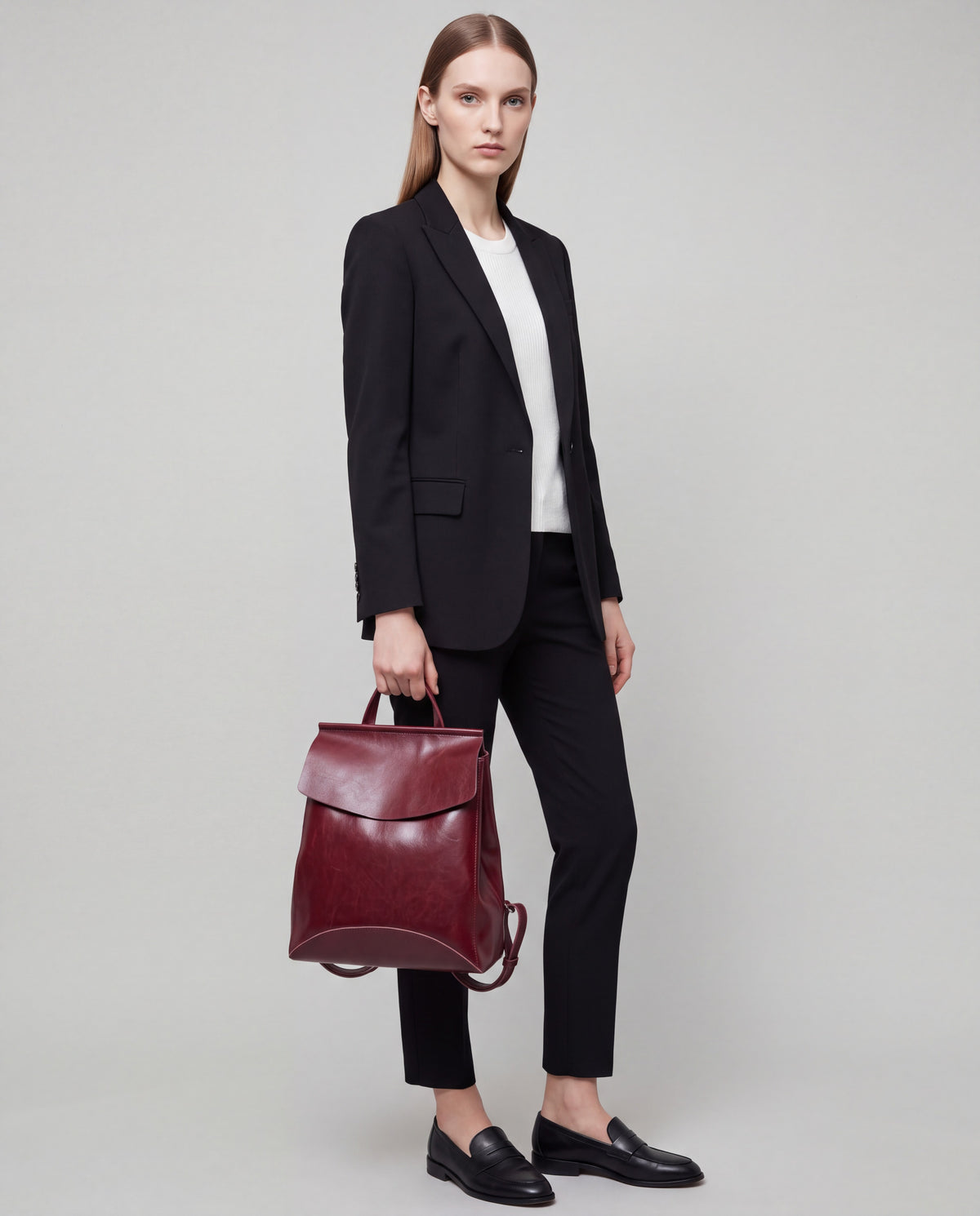 Forma bag in Red – worn by model, close-up