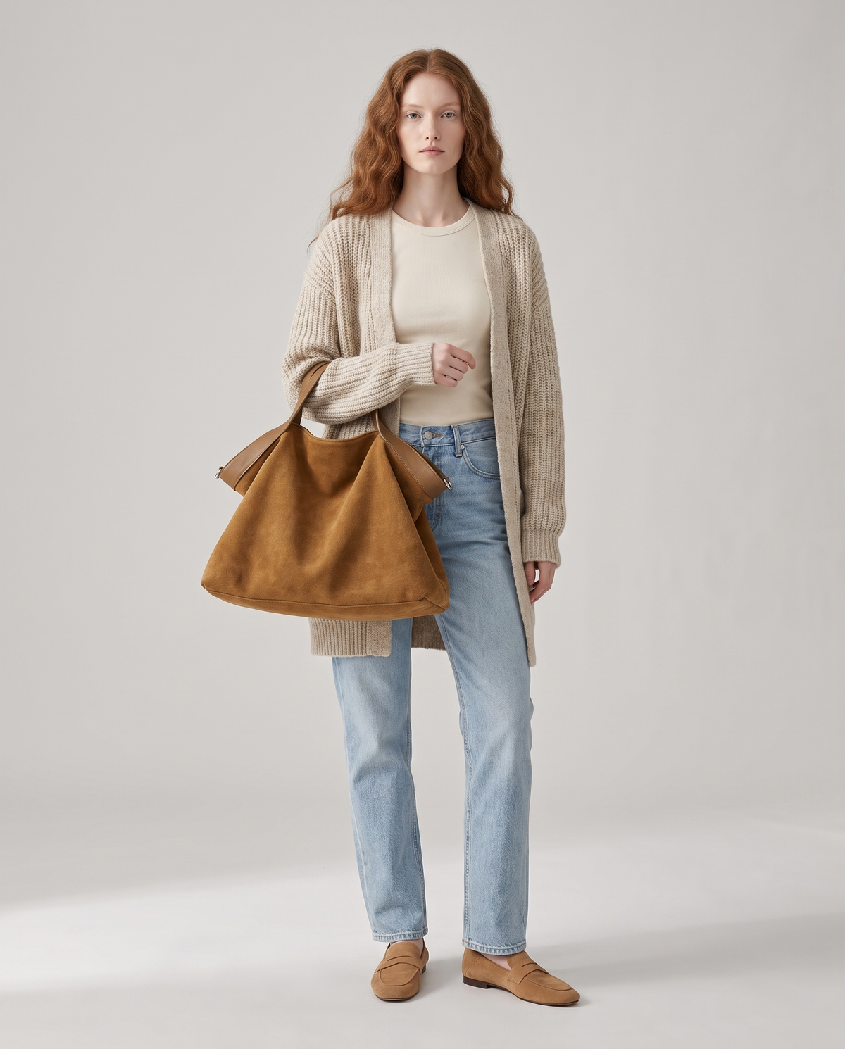 Model with the Forte suede tote in camel, full length