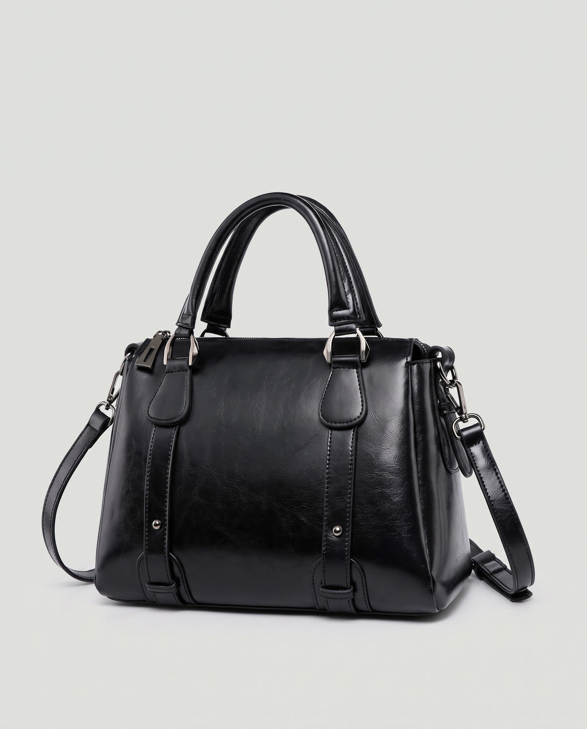 Harlow leather handbag in Black – three-quarter view with the shoulder strap attached