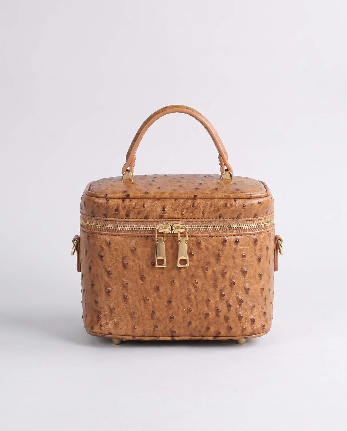 Brindisi ostrich-embossed vanity bag in Cognac – front view