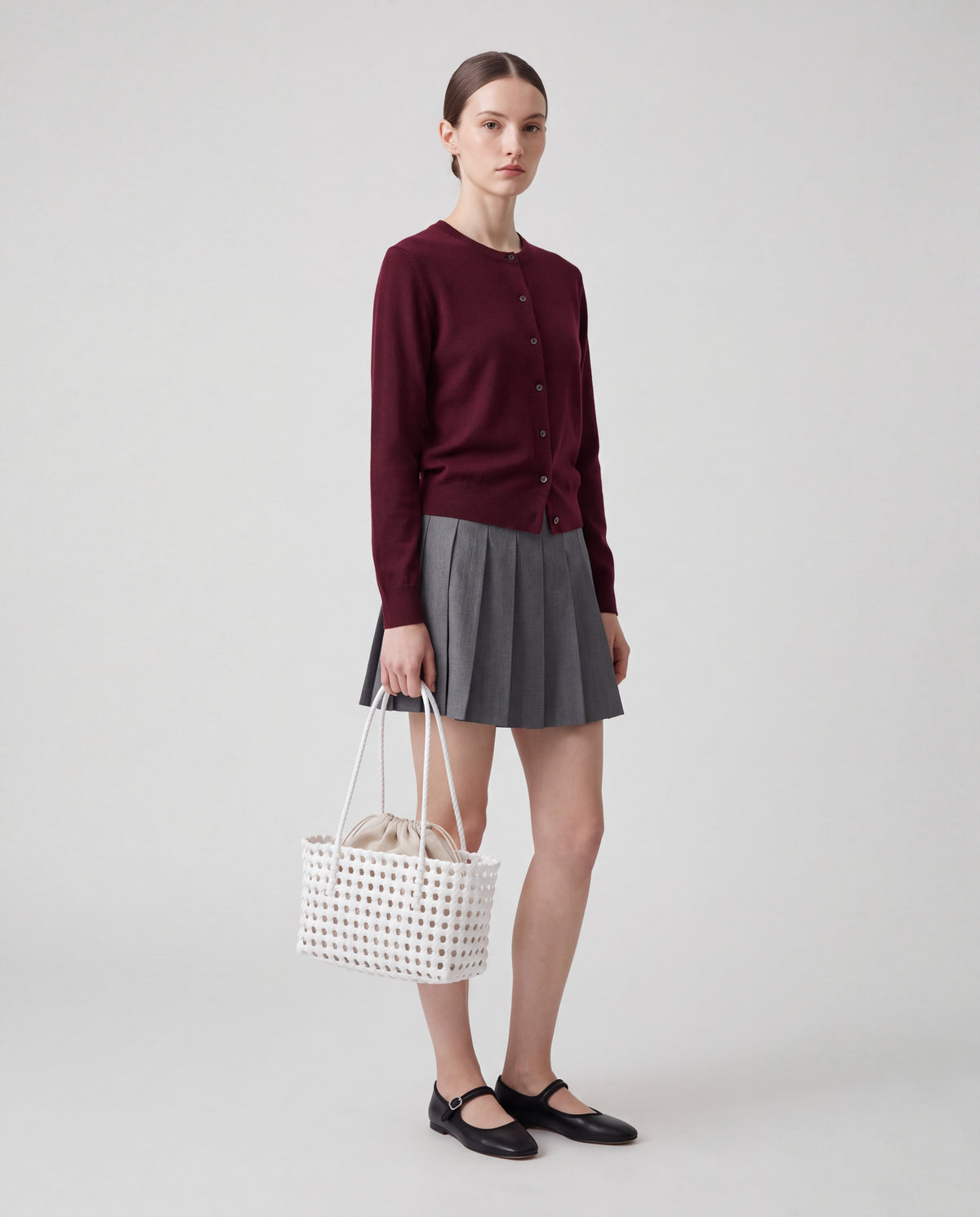 Lattice bag in White – worn by model, full length
