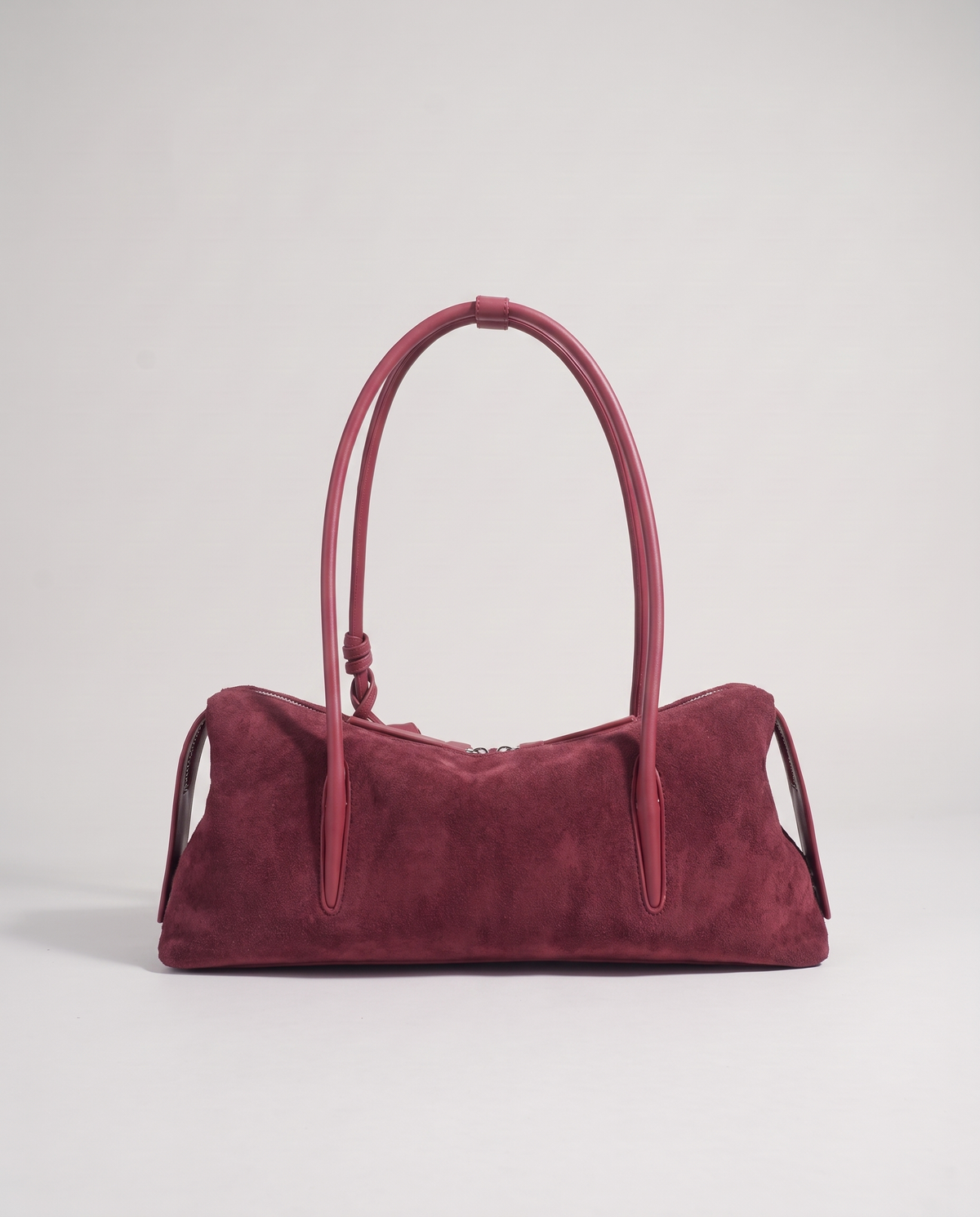 Isola suede shoulder bag in burgundy, back view