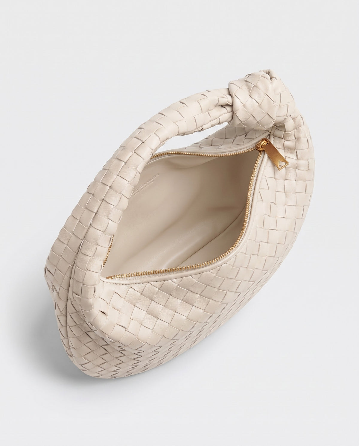 Knot Maxi woven leather shoulder bag in White – inside view with the zip open