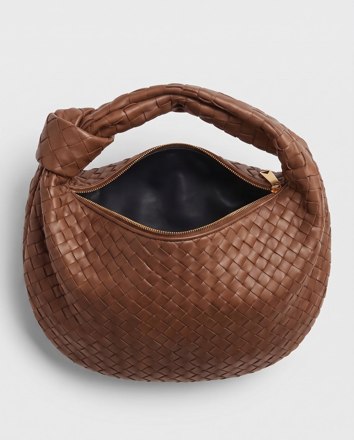 Knot Midi woven leather bag in Brown – inside view with the zip open