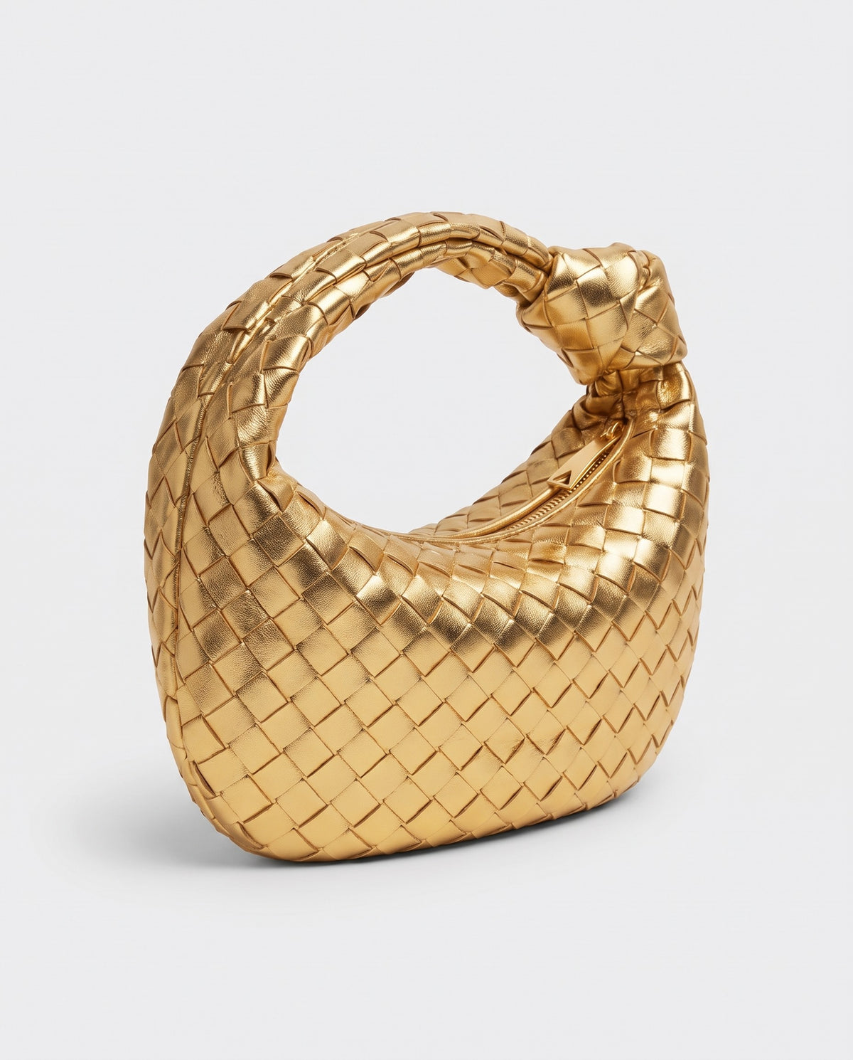 Knot Midi woven leather bag in Gold – three-quarter view