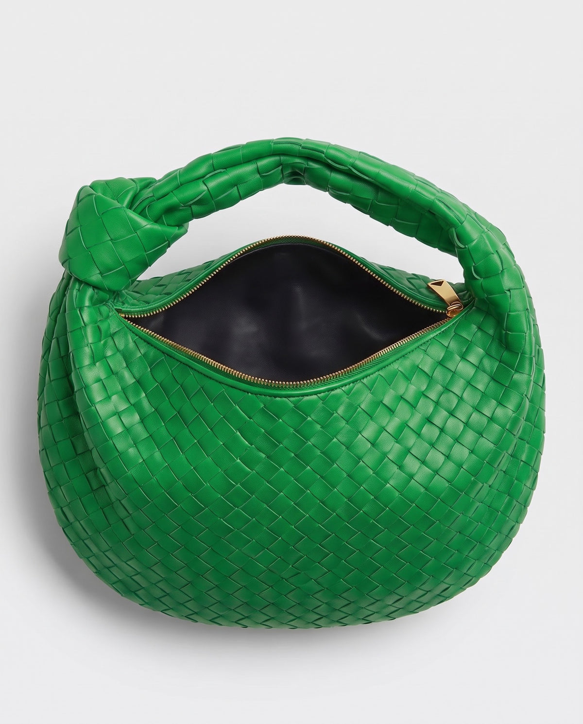 Knot Midi woven leather bag in Green – inside view with the zip open