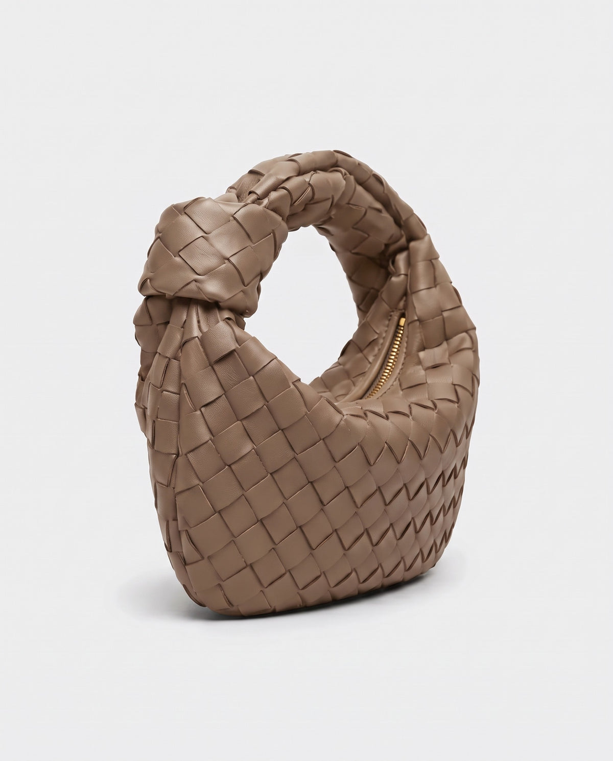 Knot Mini woven leather bag in Camel – three-quarter view