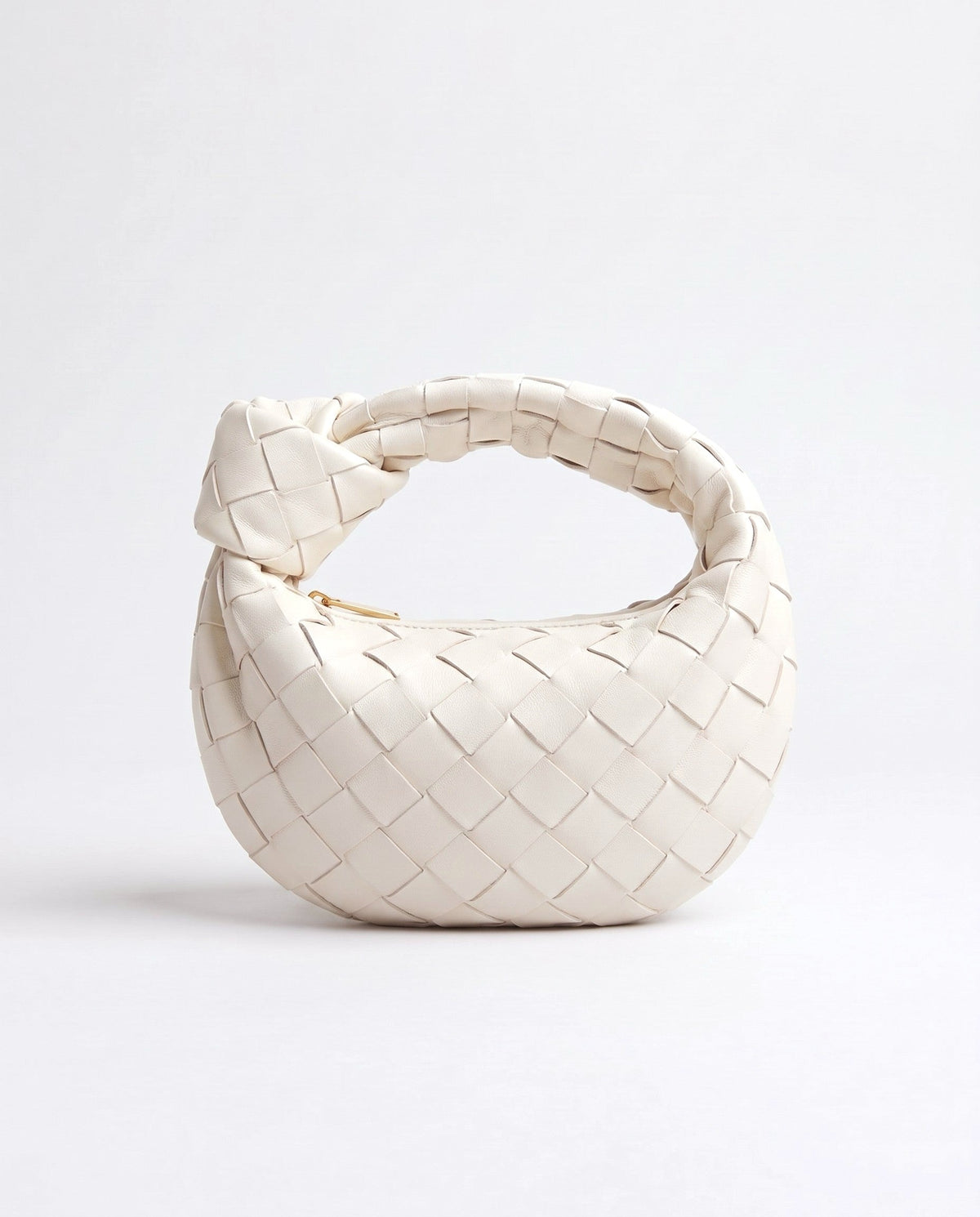 Knot Mini woven leather bag in Chalk – front view