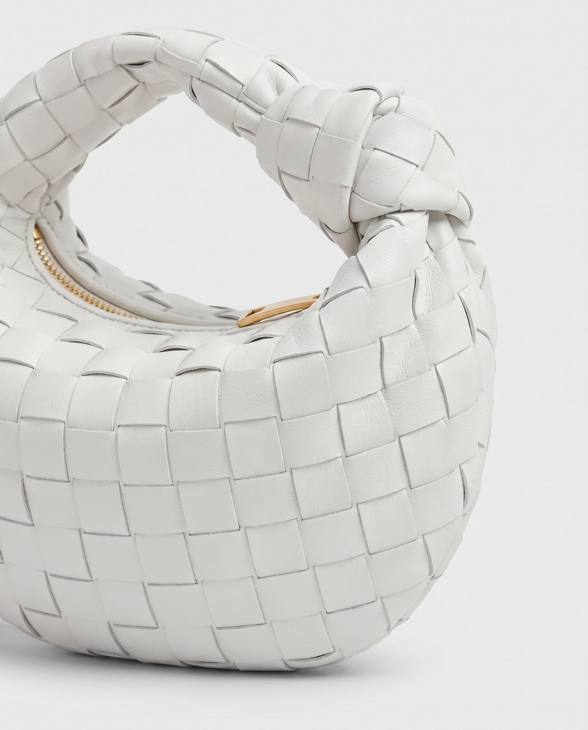 Knot Mini woven leather bag in Chalk – close-up of the woven leather