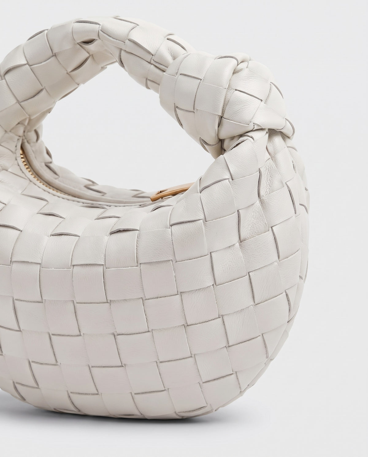 Knot Mini woven leather bag in Chalk – close-up of the woven leather