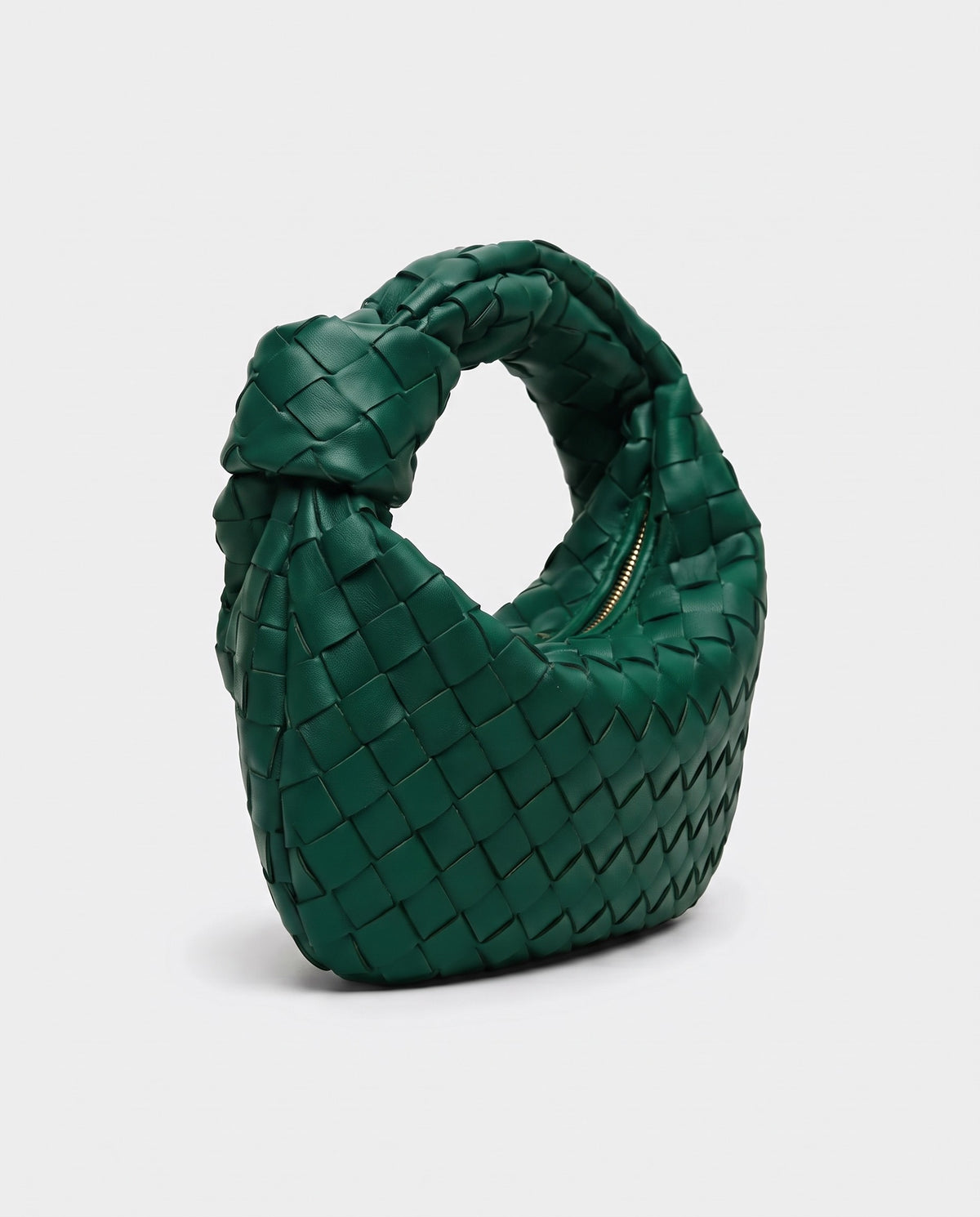 Knot Mini woven leather bag in Emerald – three-quarter view