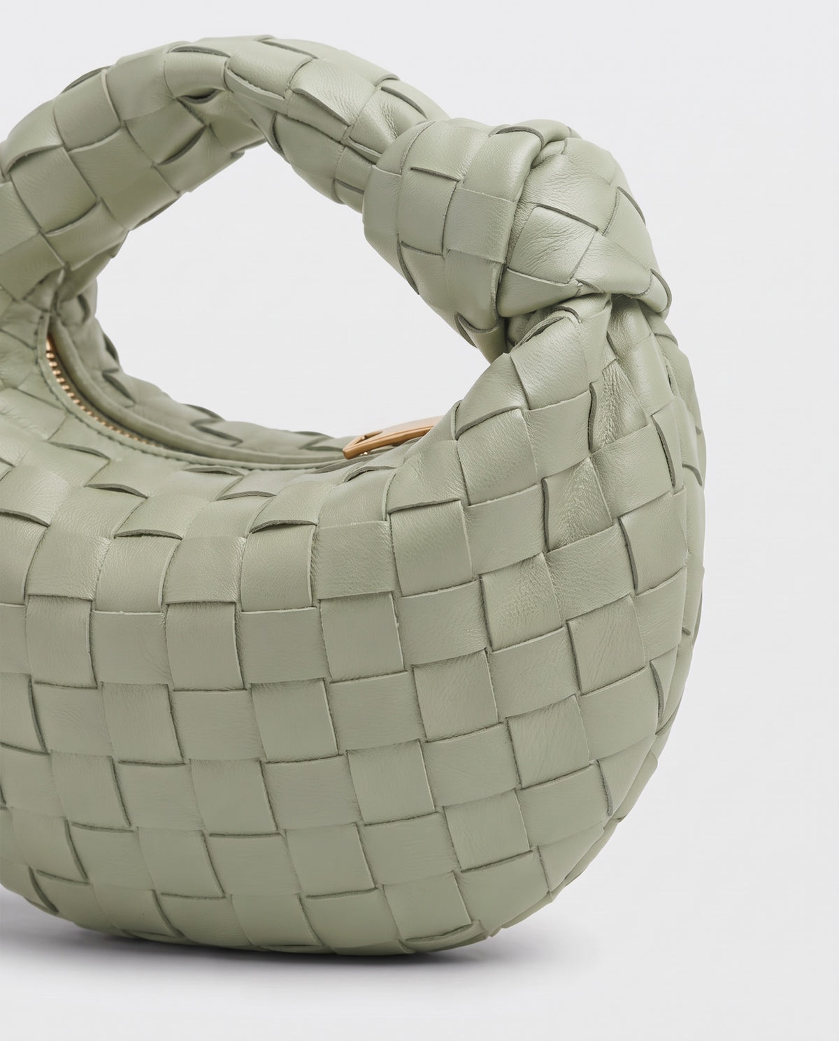 Knot Mini woven leather bag in Pistachio – close-up of the woven leather