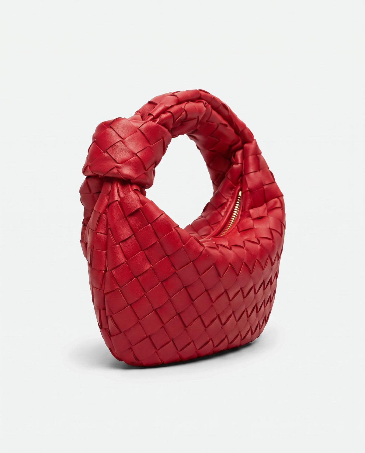 Knot Mini woven leather bag in Scarlet – three-quarter view