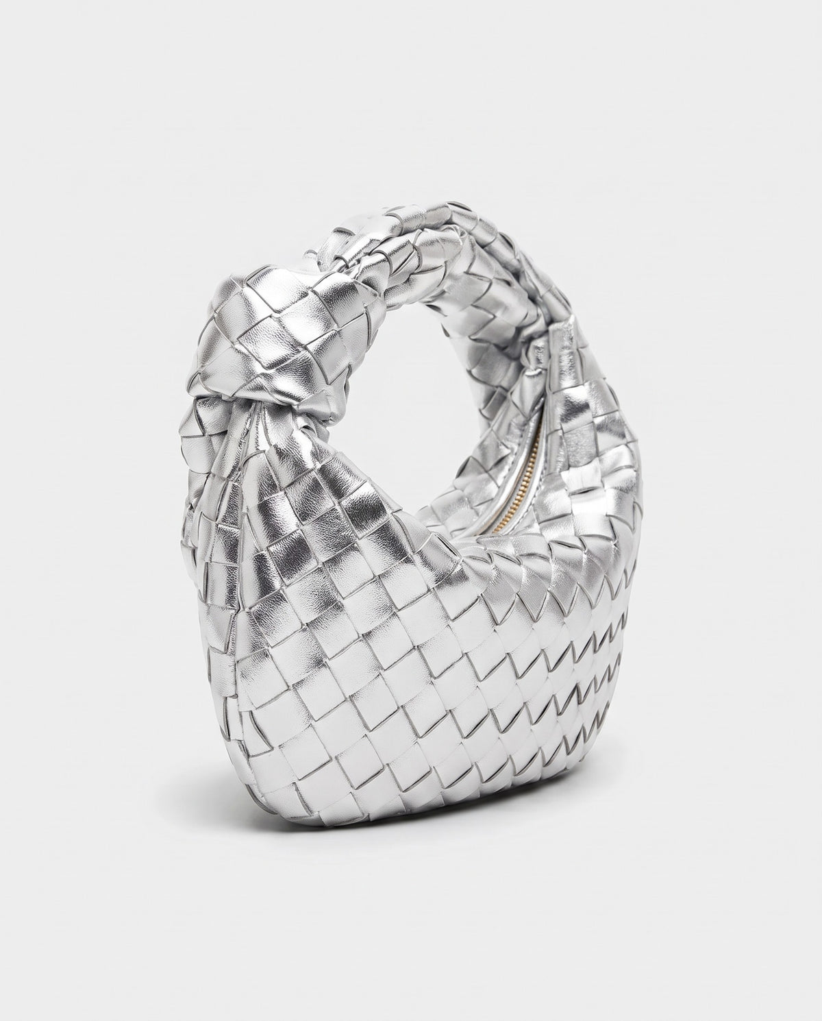 Knot Mini woven leather bag in Silver – three-quarter view