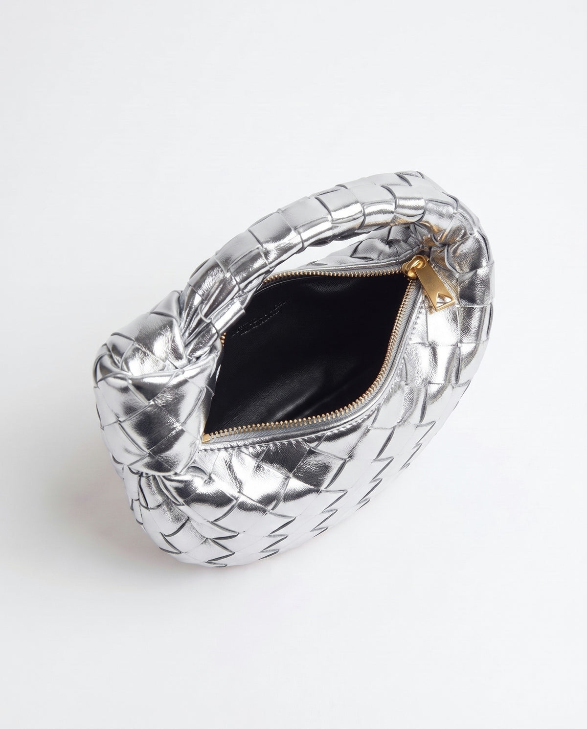 Knot Mini woven leather bag in Silver – inside view with the zip open