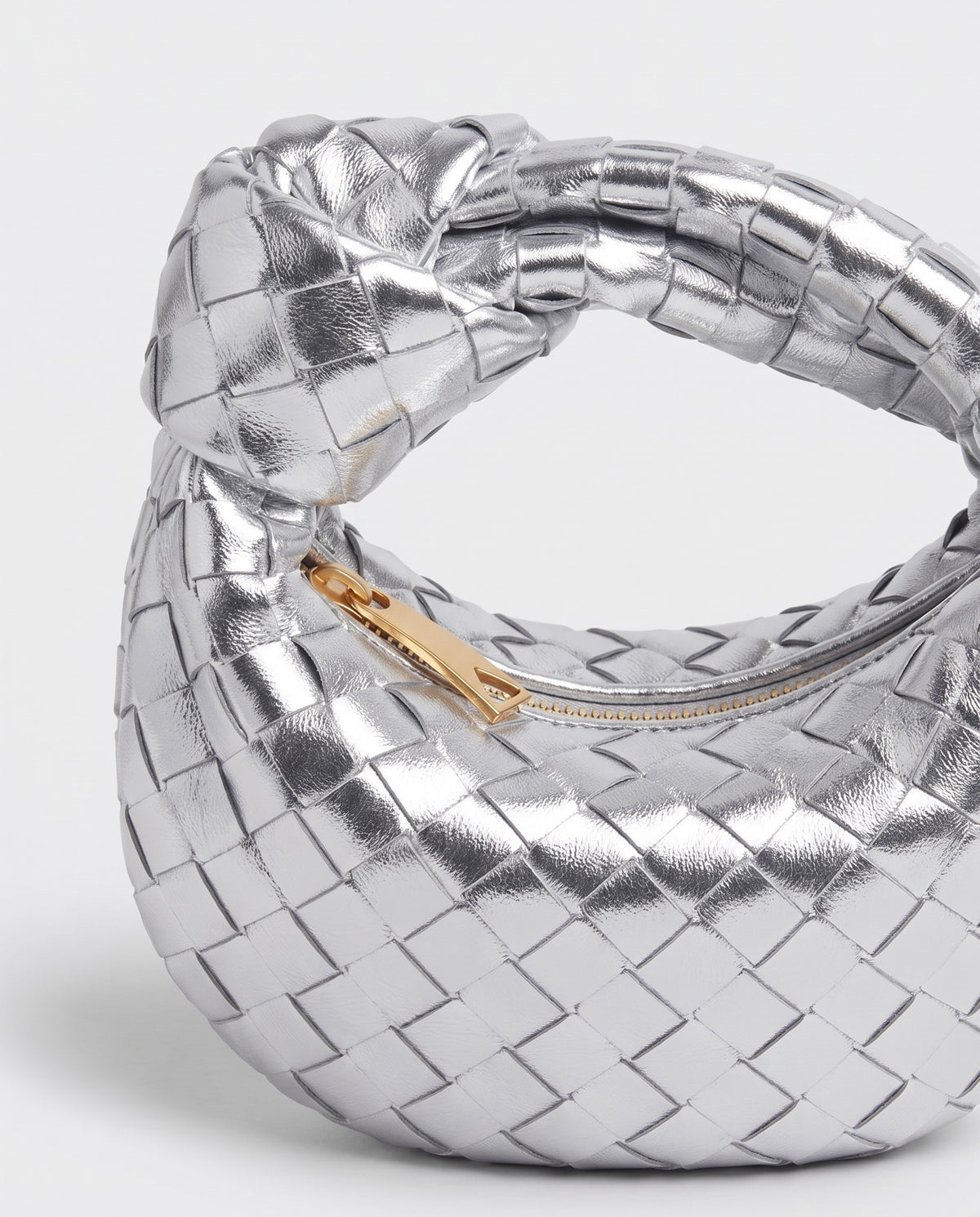 Knot Mini woven leather bag in Silver – close-up of the knotted handle