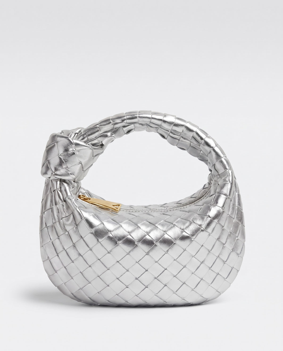 Knot Small woven leather bag in Silver – three-quarter view