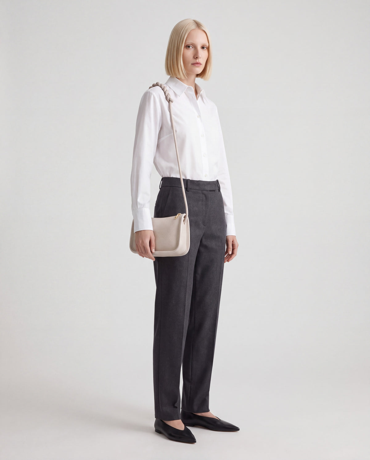 Lago bag in Ivory – worn by model, full length