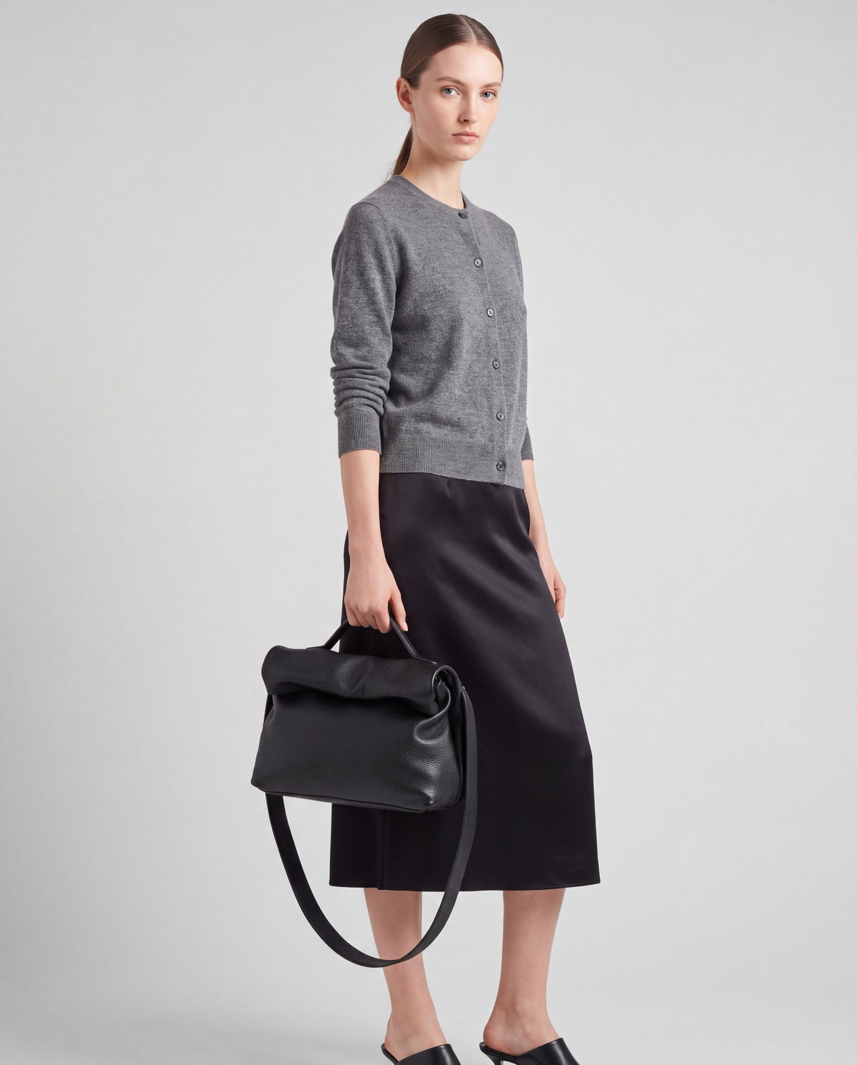 Lido bag in Black – worn by model, close-up
