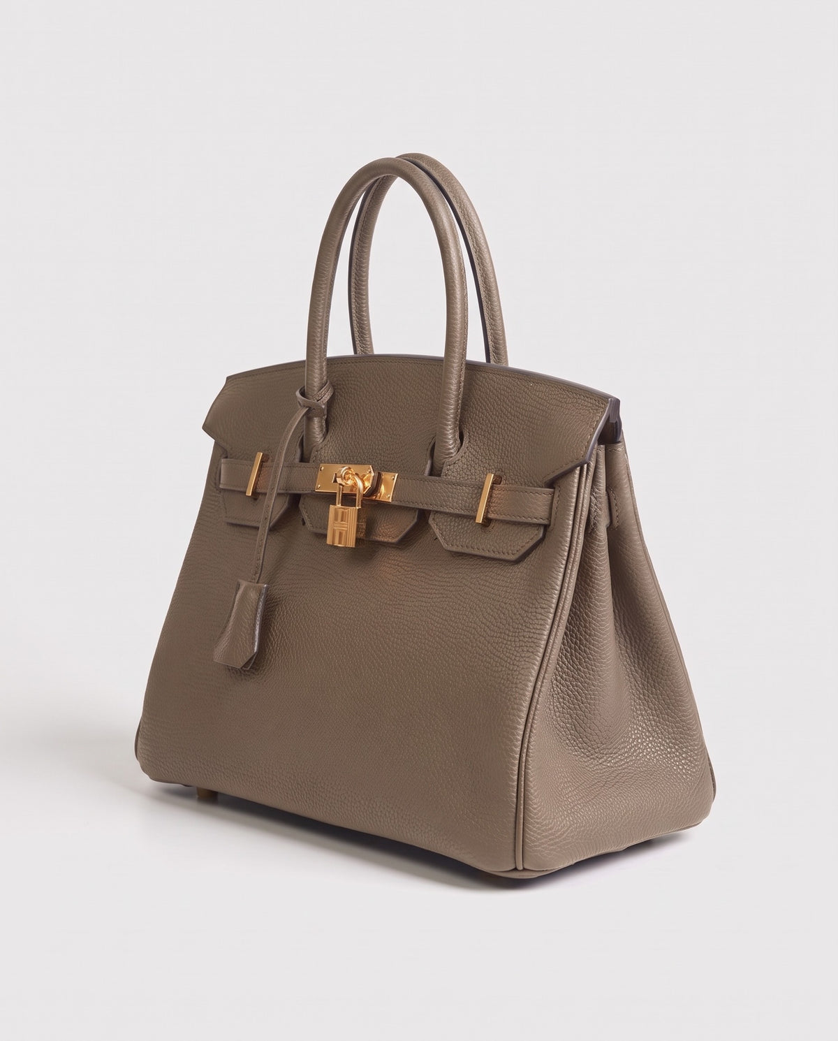 Lock Extra Large leather top-handle bag in Taupe – three-quarter view
