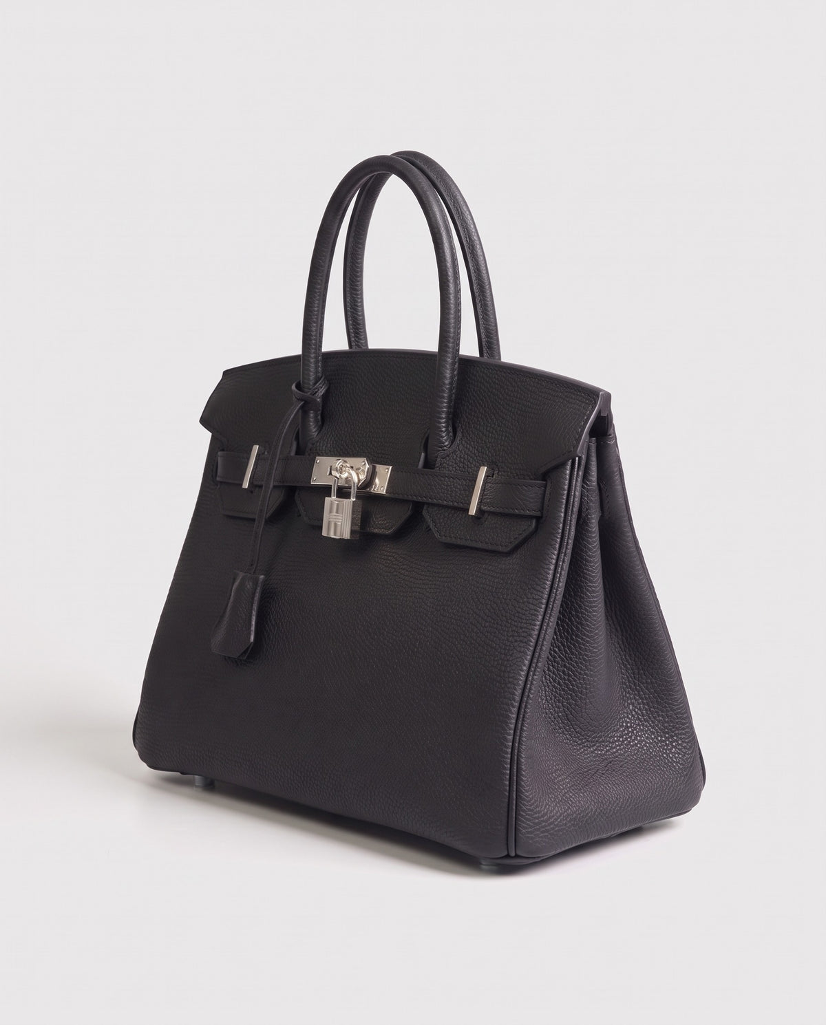 Lock Large leather top-handle bag in Onyx – three-quarter view